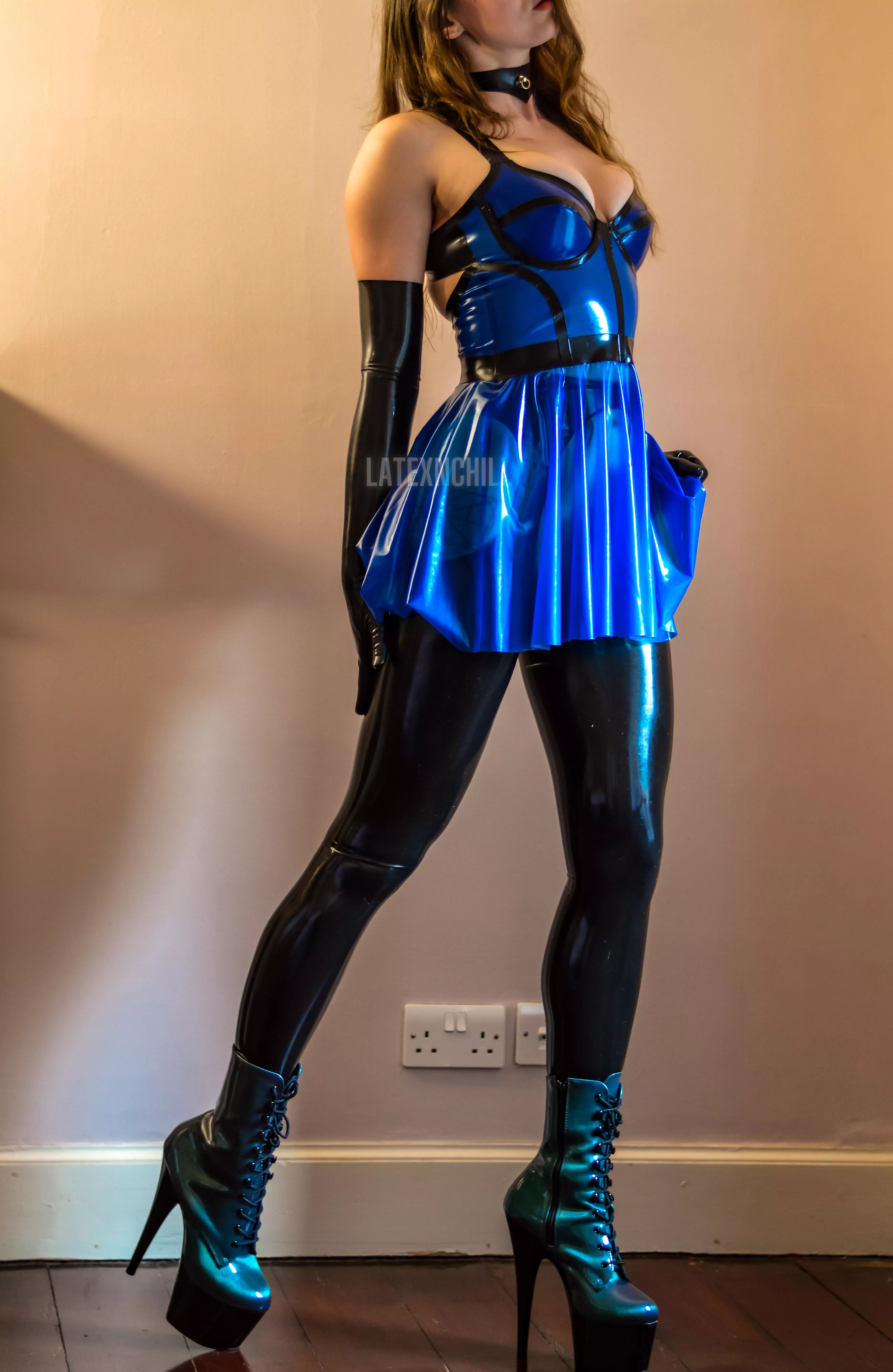 I adore the colour of these boots, and how tall they make me too.. posted by LATEXnCHILL