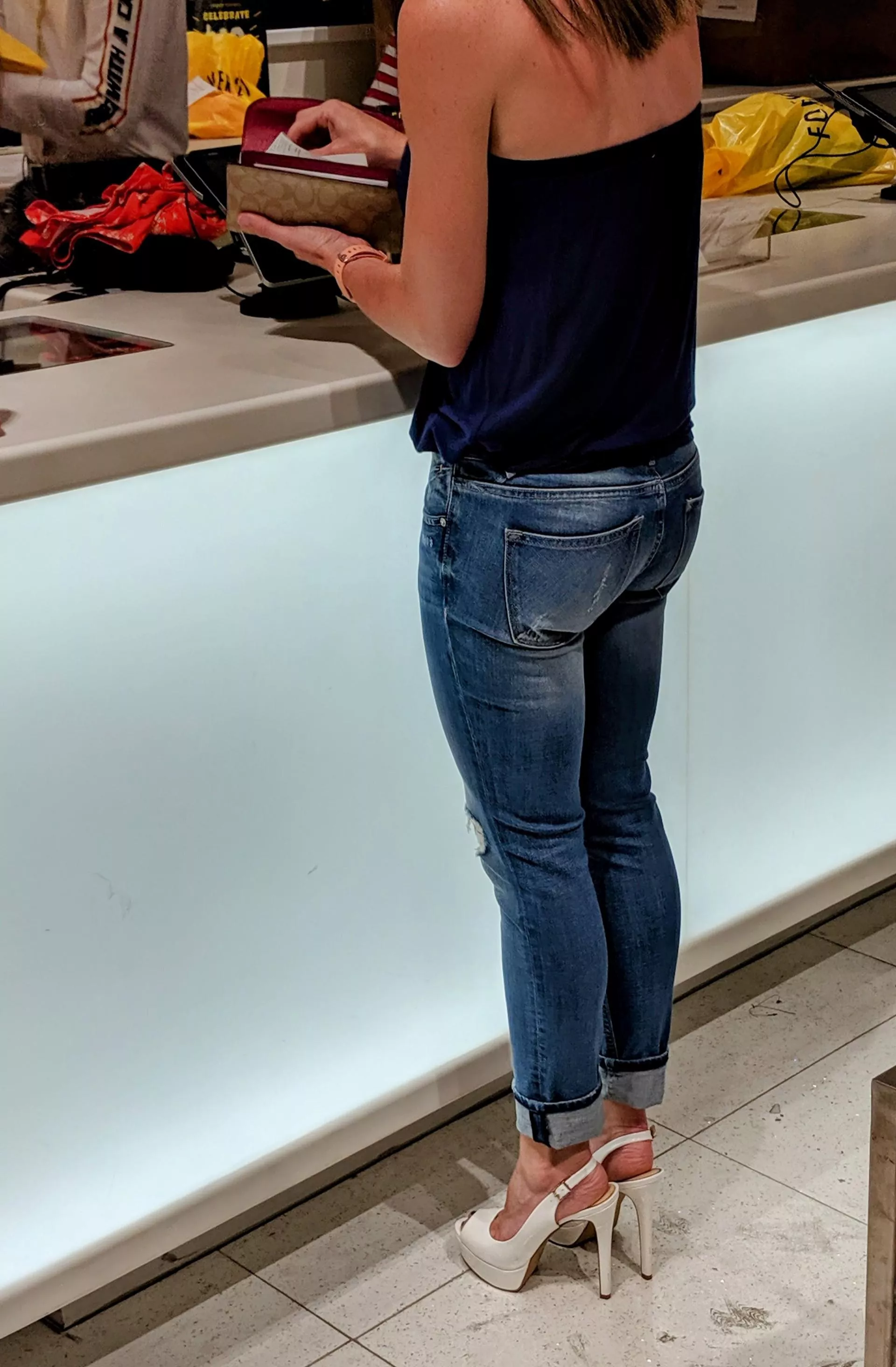 I know it's a boring picture but just thought my wife looked sexy in her tight jeans and high heels. posted by Captain_5