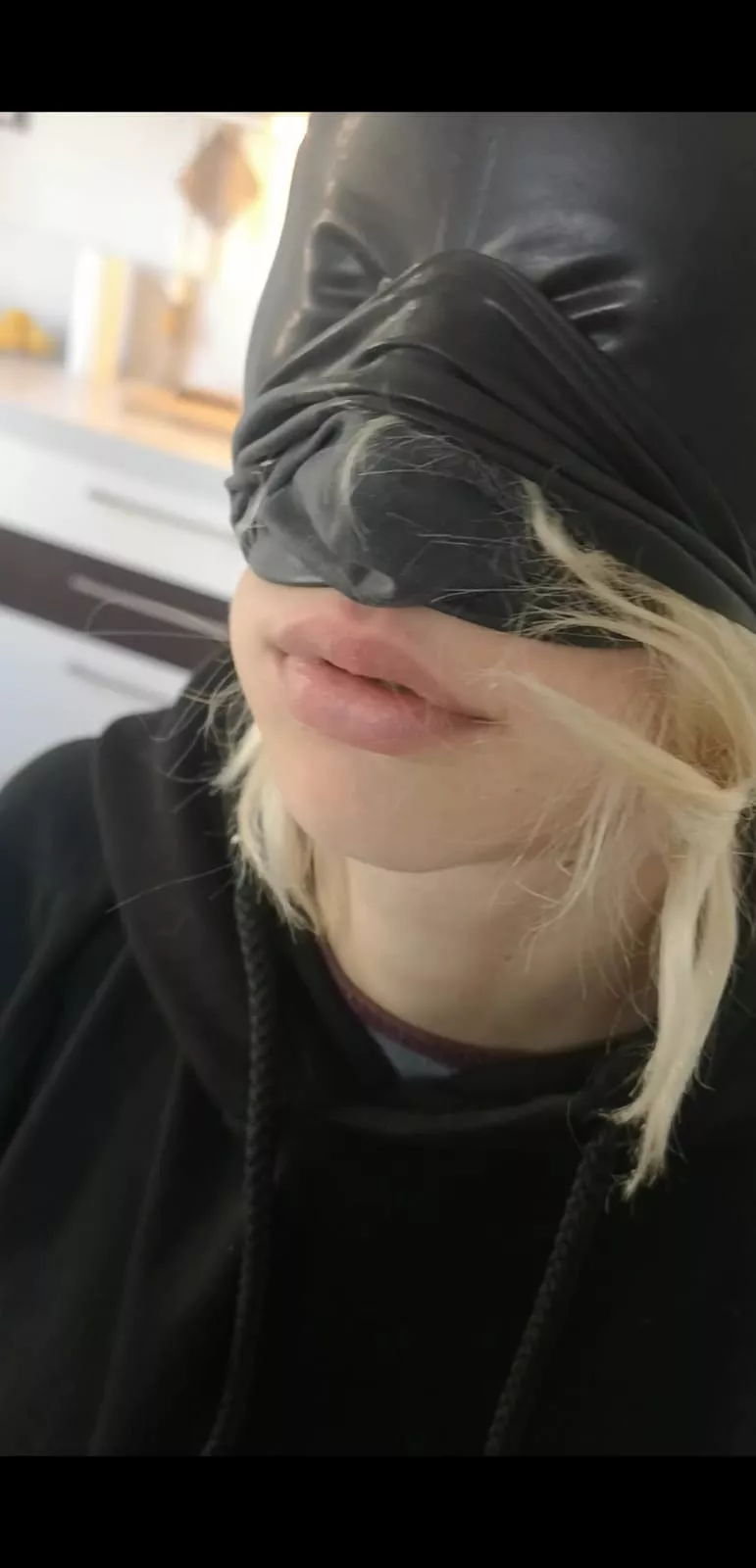 I love this candid photo Sir took of me trying out my new hood. It makes it look like I filled up my lips, which is probably my favorite part of latex hoods posted by anndroid17