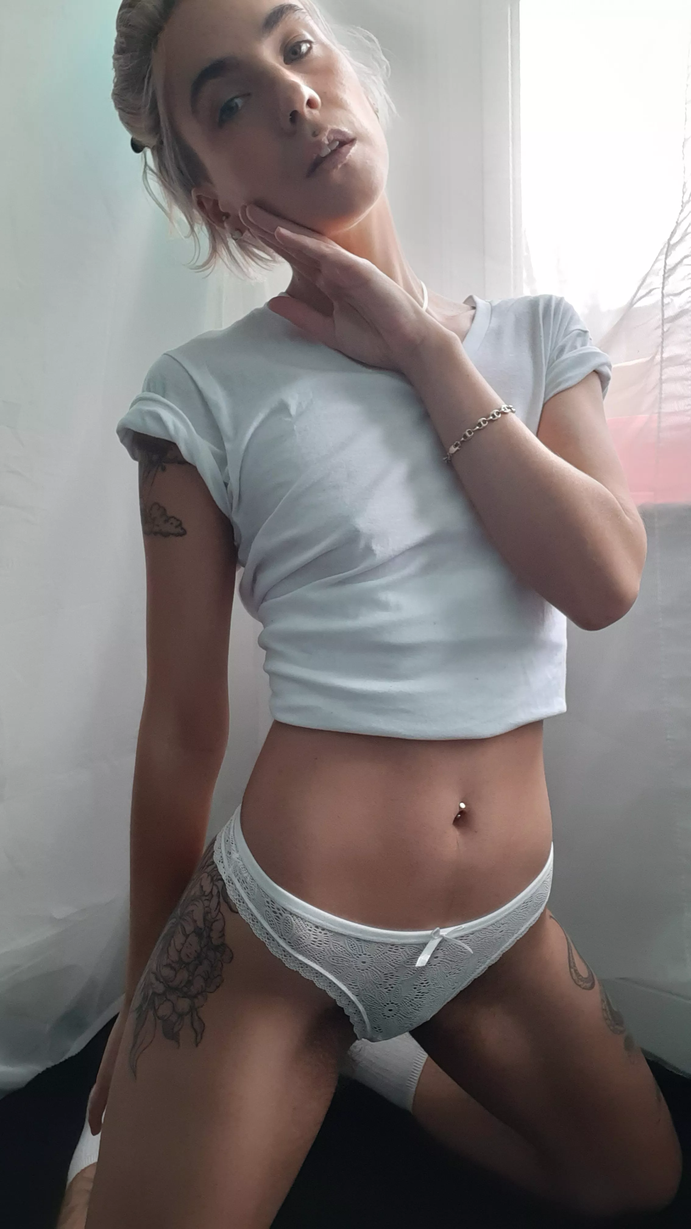 i love to show off my tummy so i'm always turning regular shirts into crop tops ;p posted by maygreyy