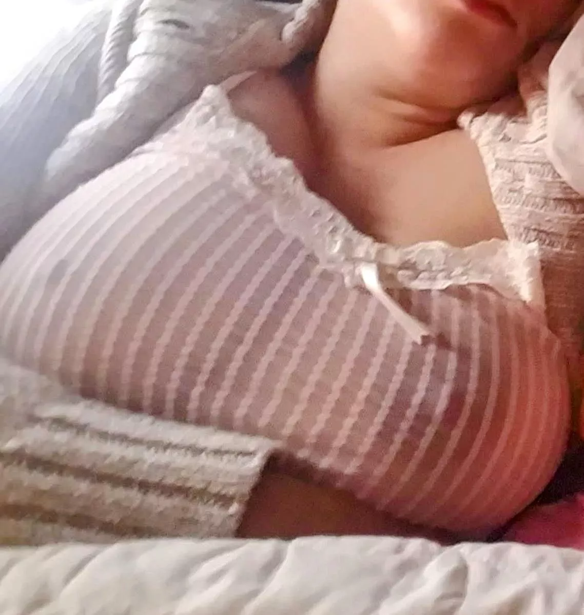 I was lounging our friends house and this was the view of my open sweater... posted by StellaSteele69