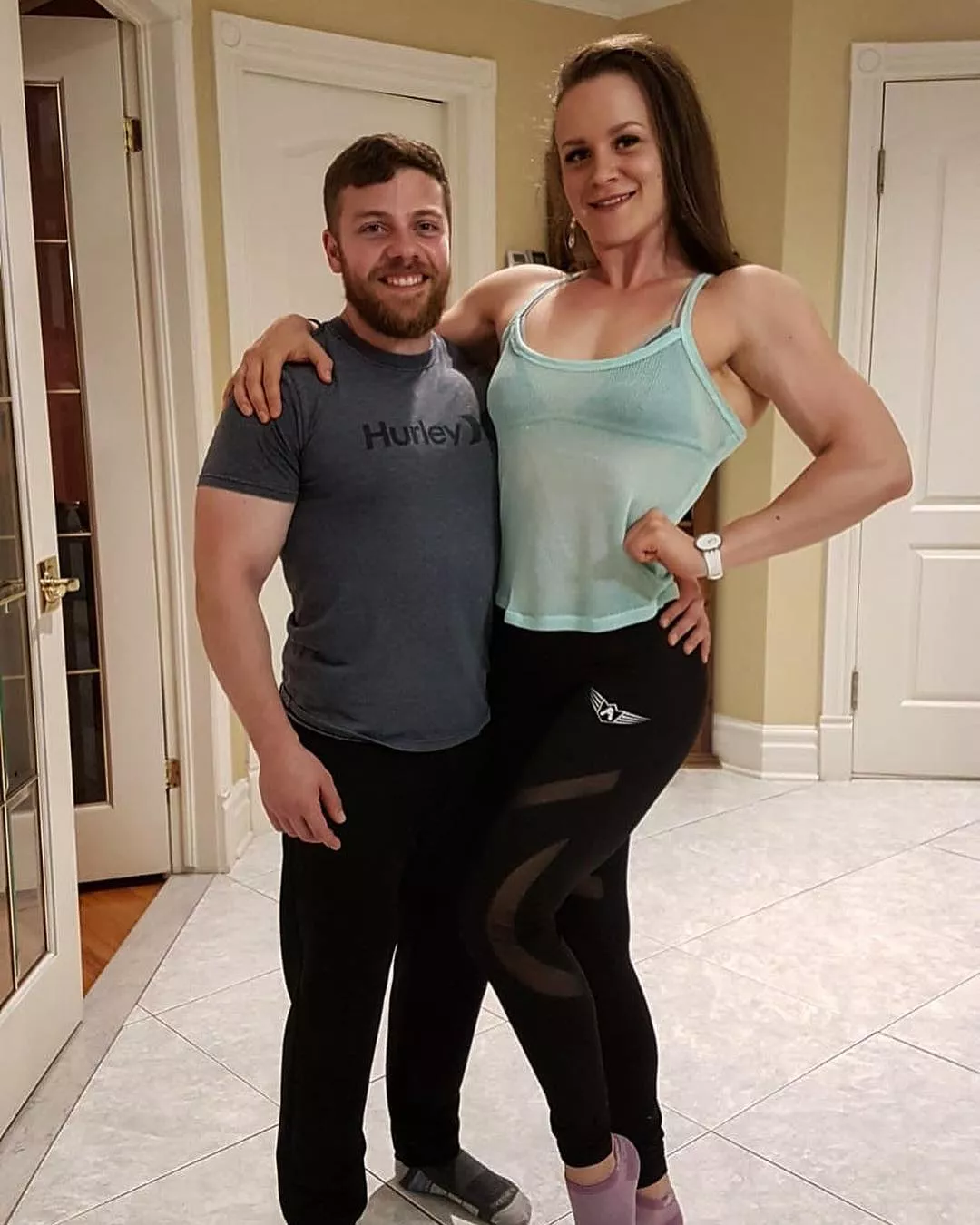 Irina Dubrovina towering over her boyfriend posted by PM_ME_MuscleGirls