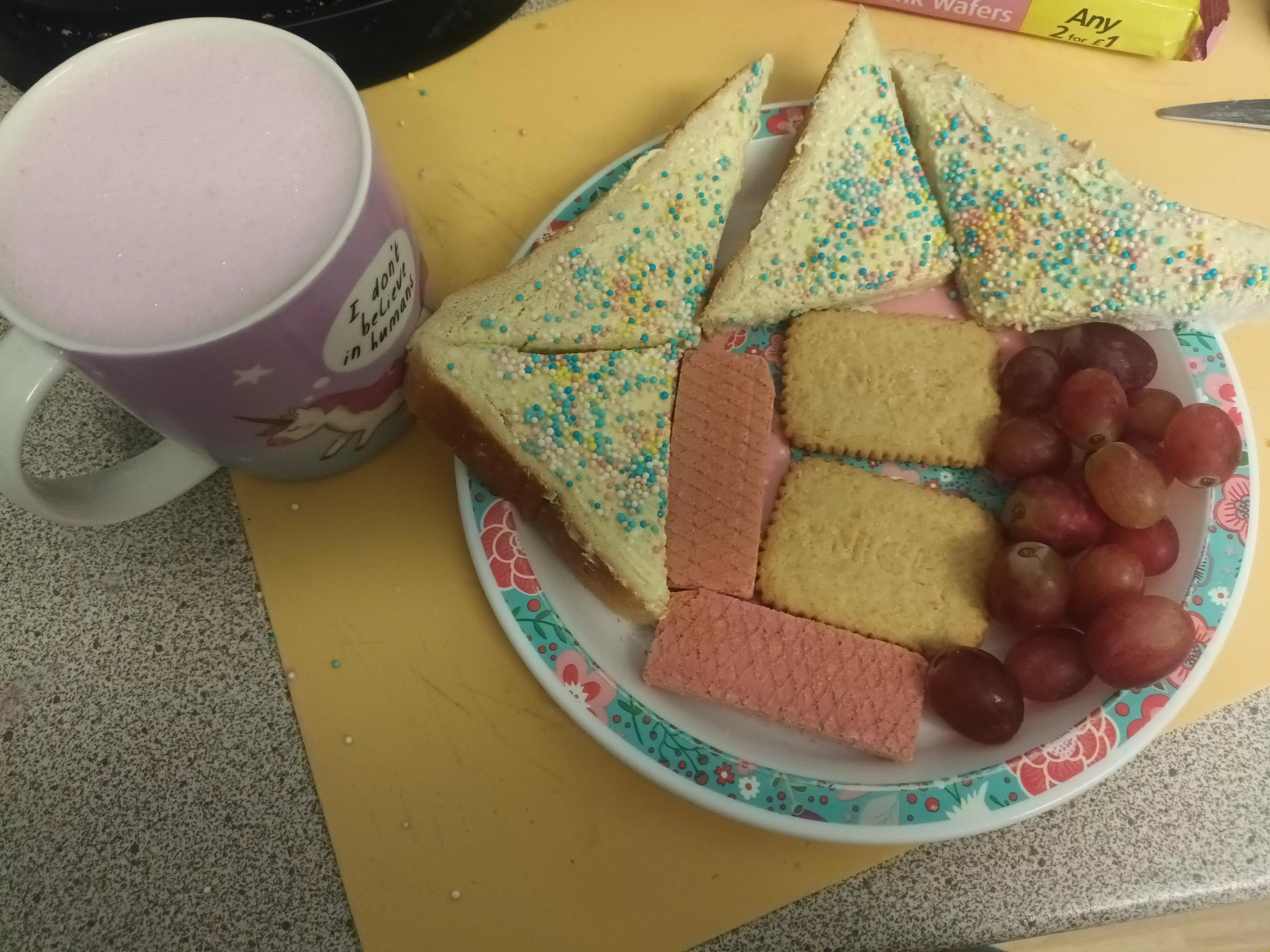 I've earnt the ultimate little breakfast! Spinkle bread, pink wafers, biscuits, grapes and bubblegum milkshake! posted by BooBone