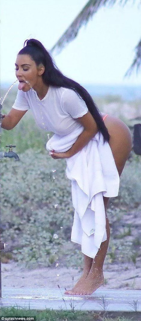 Kim getting a drink posted by ilovebigasses11