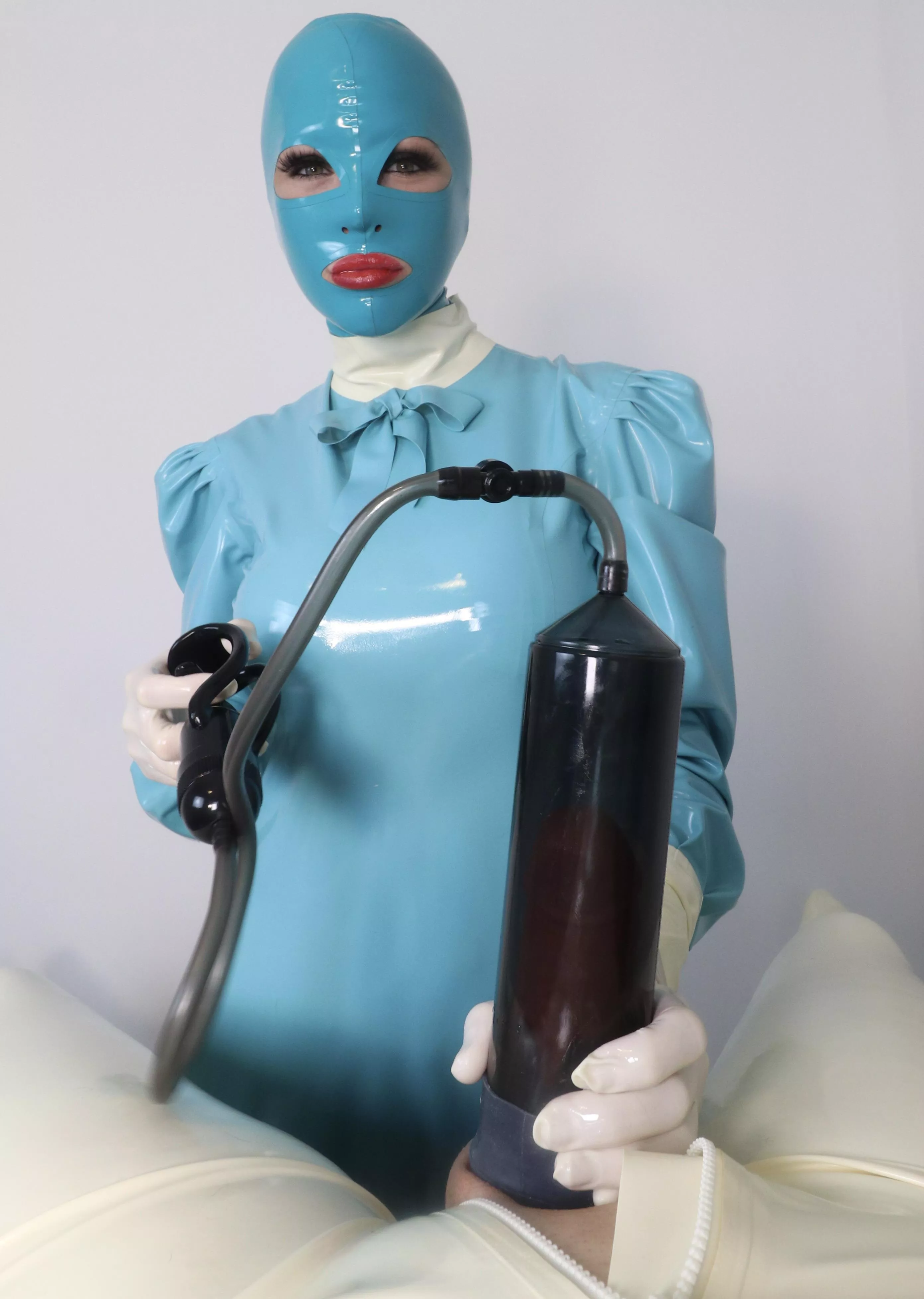 Latex Camille with a Penis Pump posted by double_clone