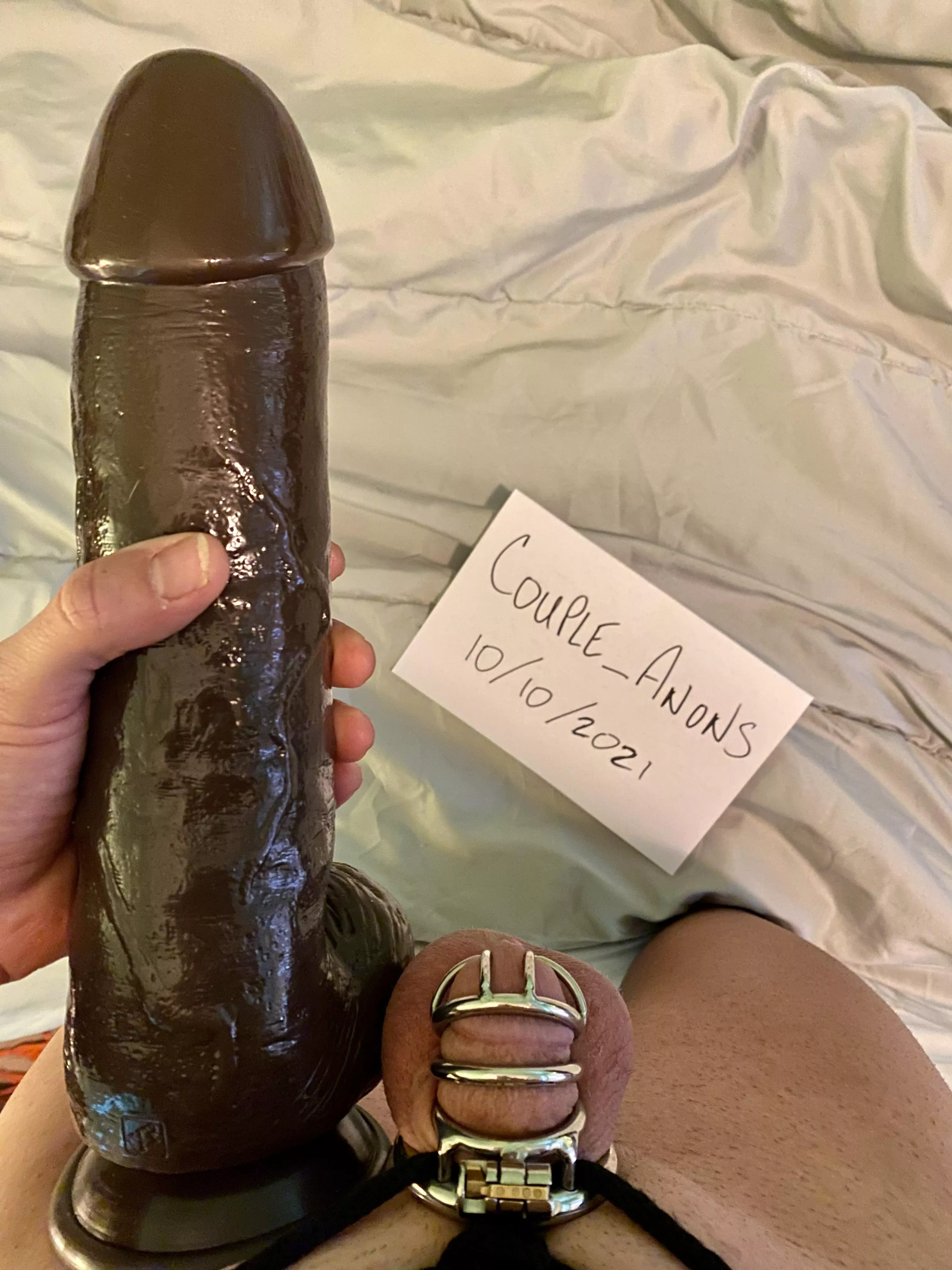 Locktober Day 10: “Size Comparison”. Her new toy vs me tied to prevent growth. (See day 9 for what it does to her pussy). Also, verification!! posted by Couple_Anons