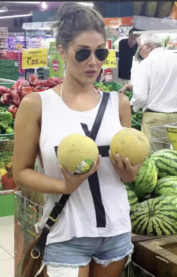 Lucy holding her melons posted by fcazaldo