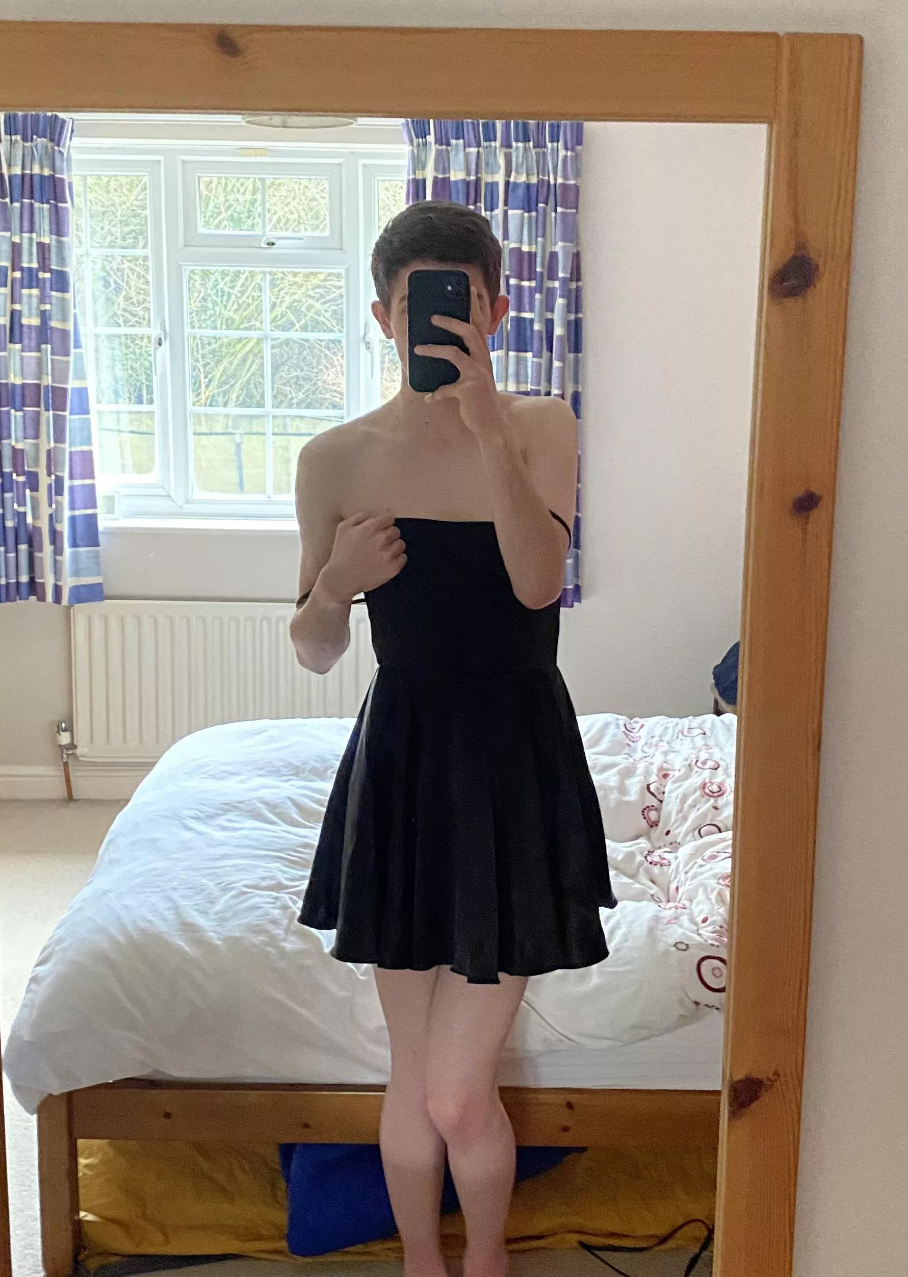 Me being girly in front of the mirror in a black dress :) posted by LostInSpace505