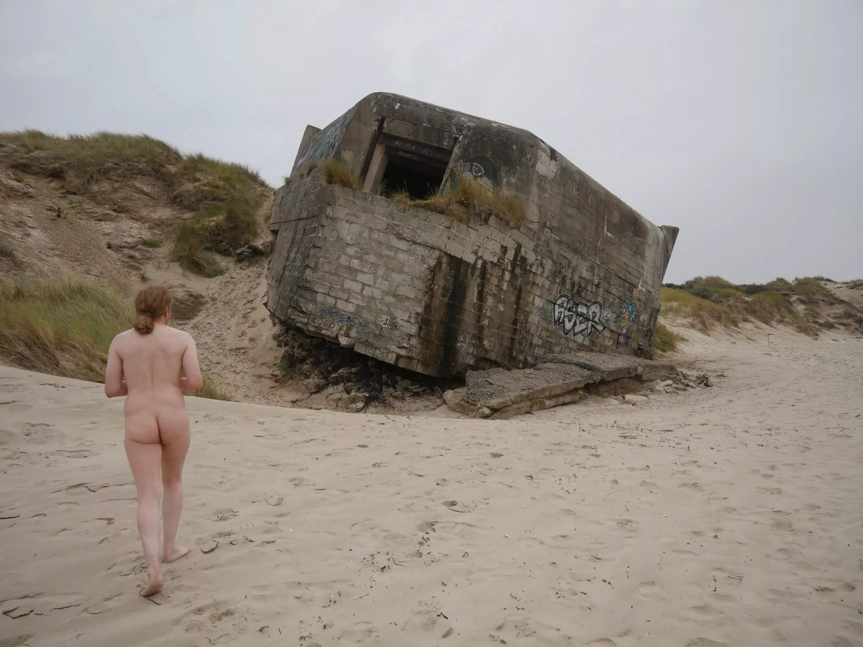 Me on a french nudist beach with a WW2 blockhaus posted by rinjin27