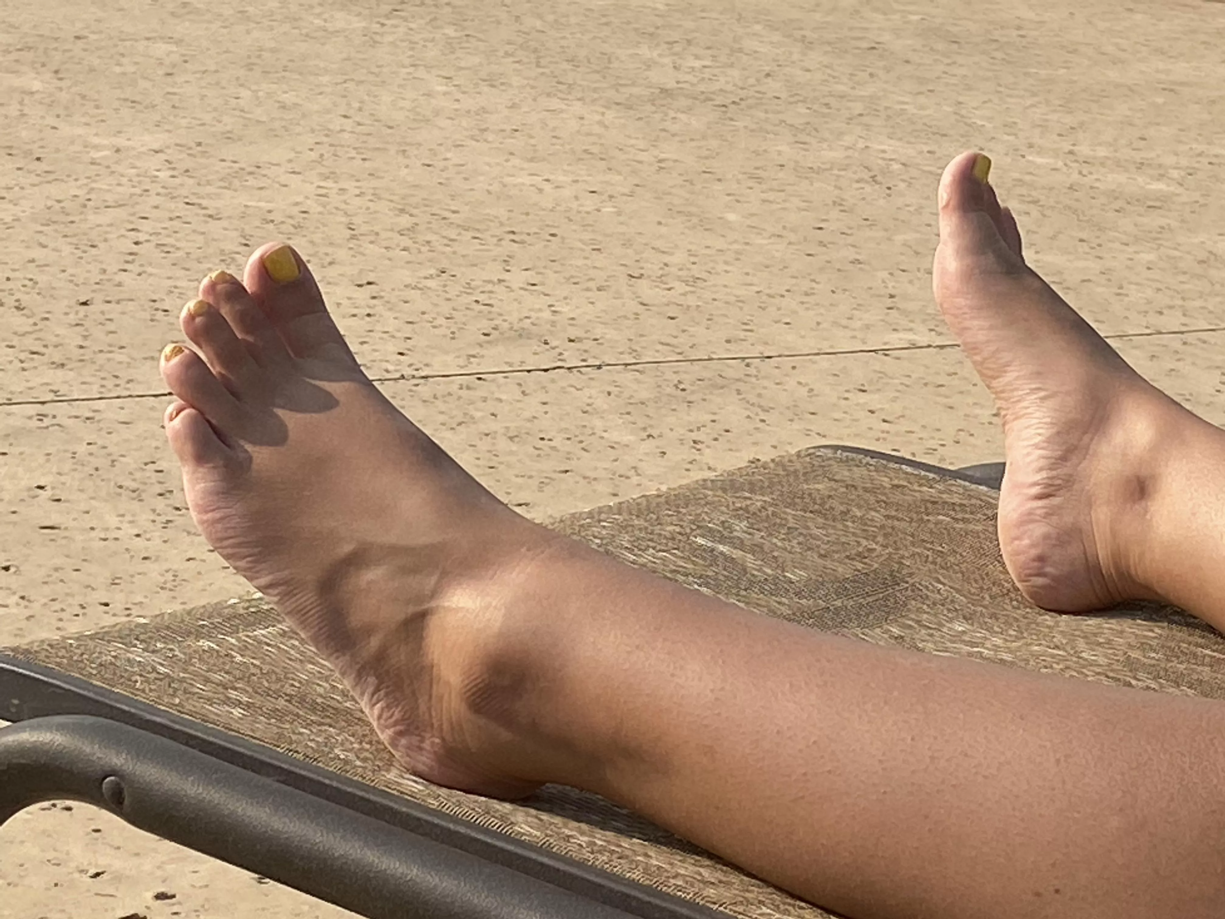 My pretty feet catching some sun. posted by BarefootSunflower87