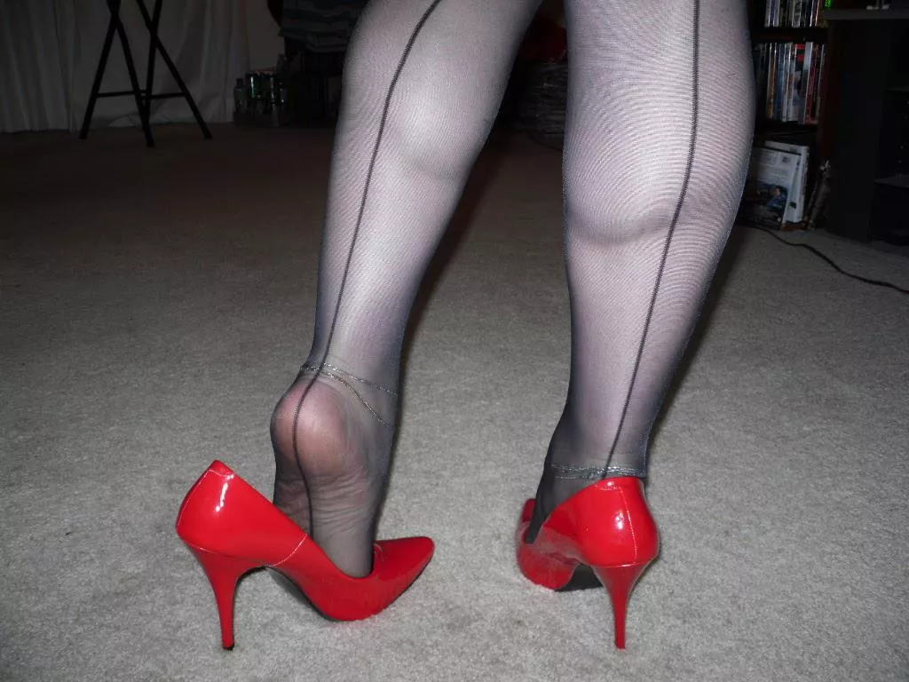 My stocking feet in classic red pumps posted by TNnylonFeetLuv