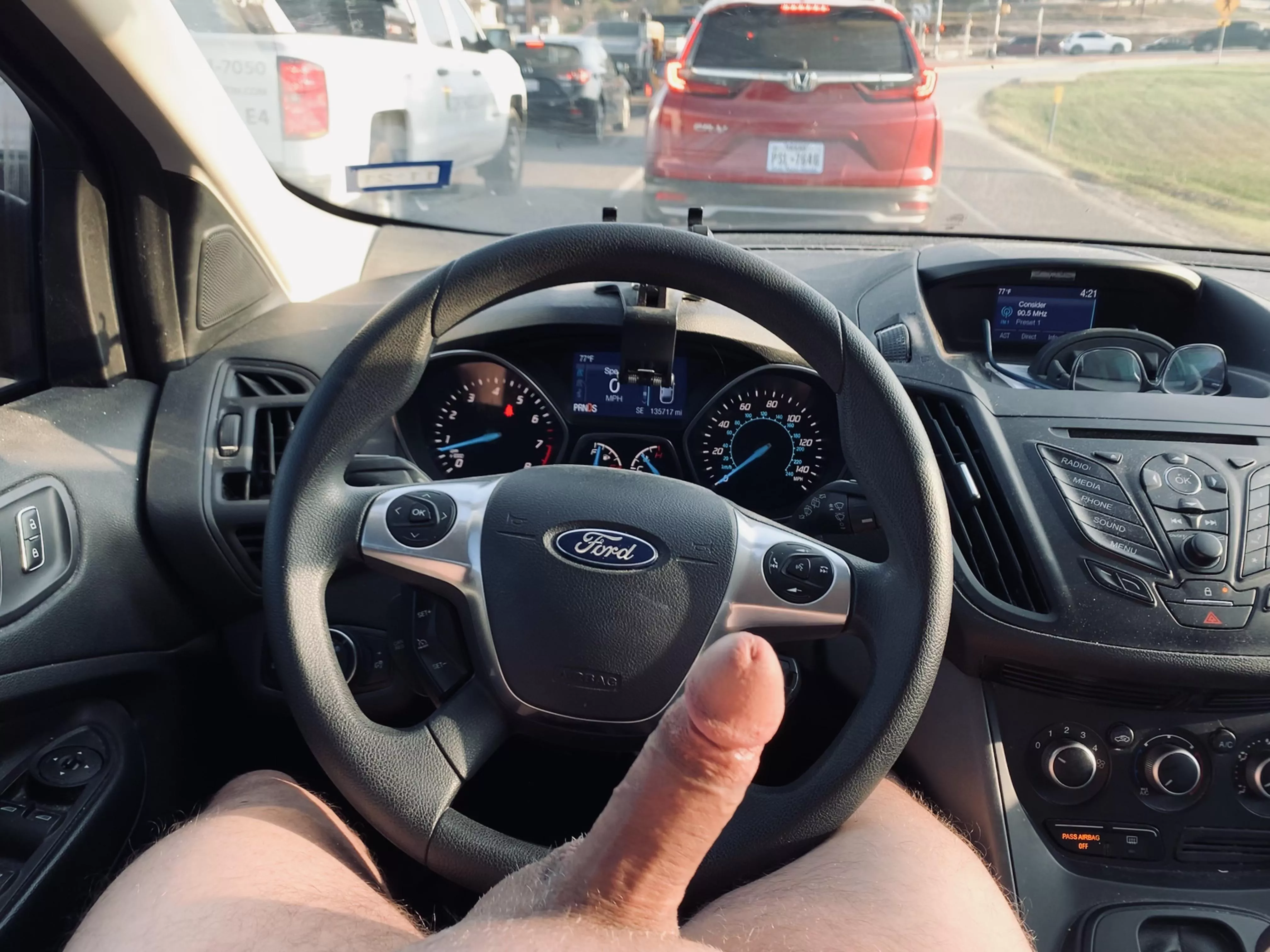 Naked driving in rush hour traffic posted by nakeddriveratx