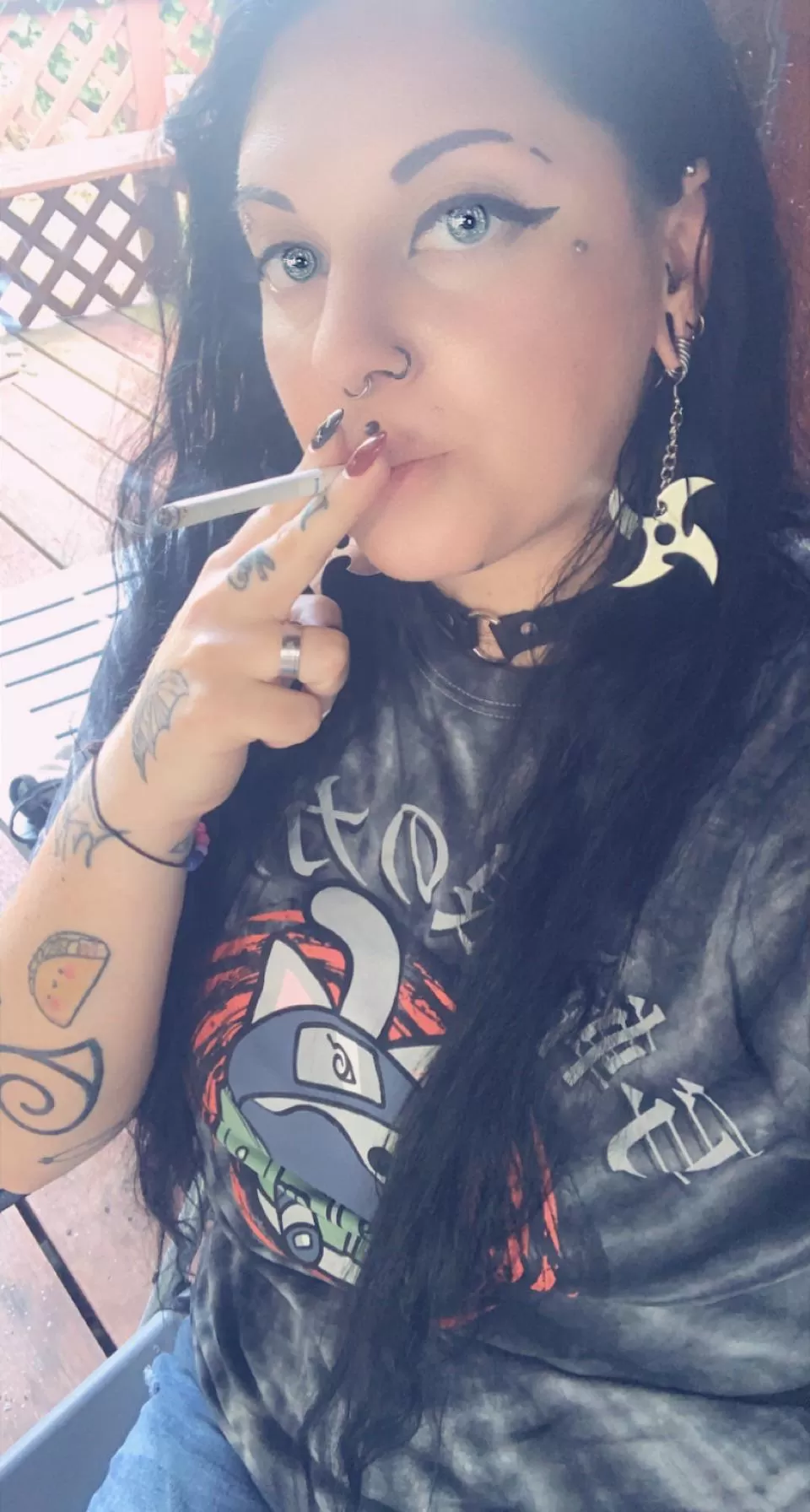 Naruto shirt and shuriken earrings posted by GothFieri84