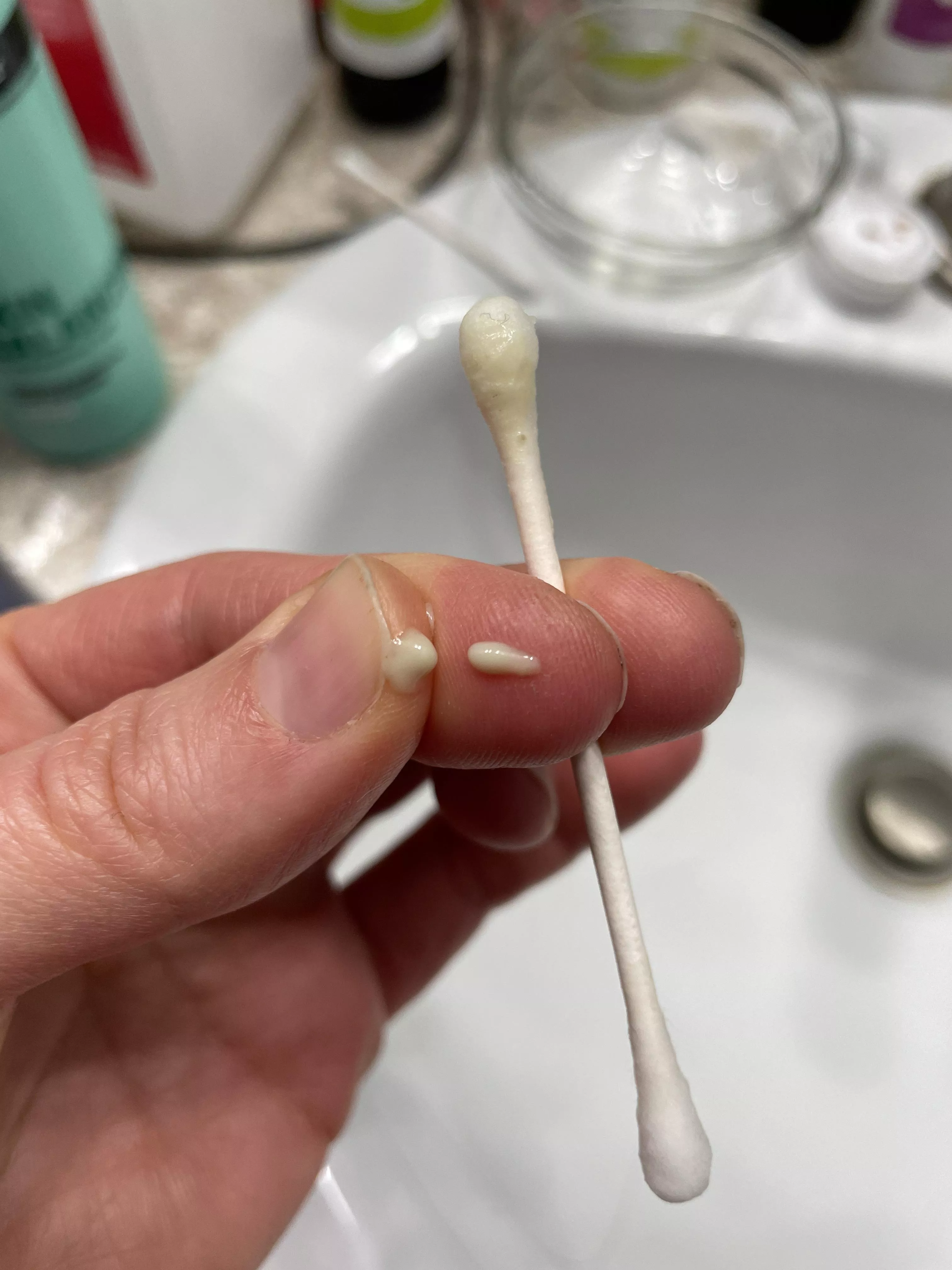 New piercing infection... I was cleaning the earring and trying to relieve some of the itching by pulling on the lobe away from the piercing and this is what I accidently let out... posted by sweetfeetcmunk