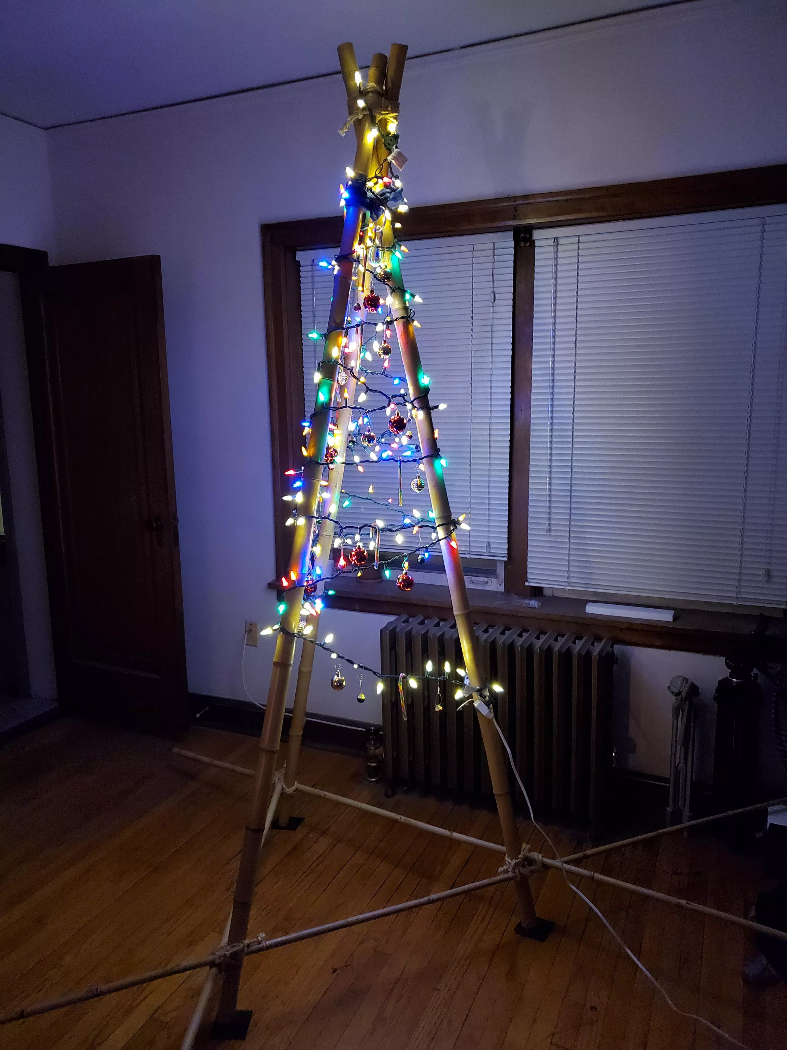 No Christmas tree, but my bondage tripod can pull double duty! posted by EvanKeystone