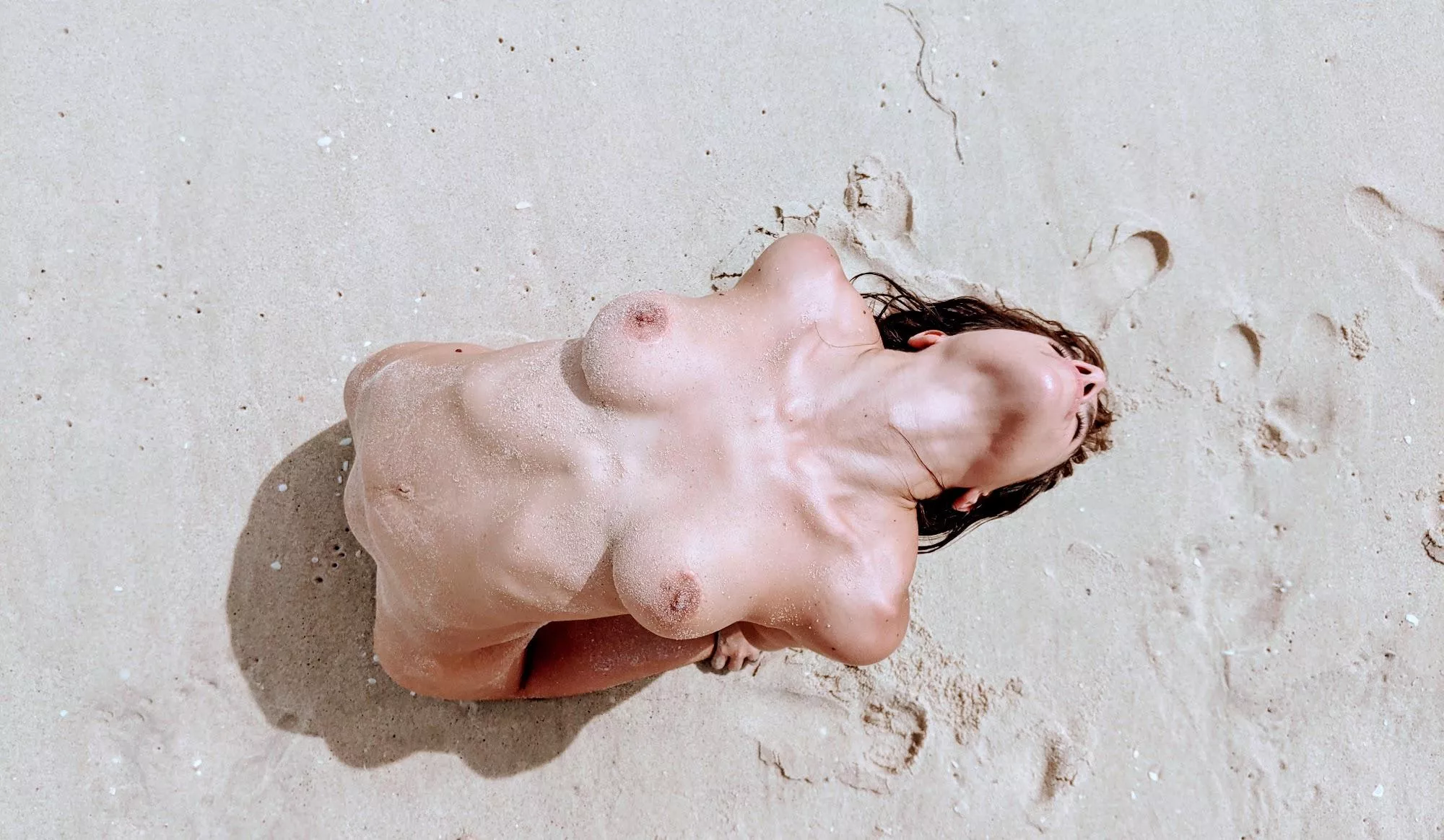 Nude yoga pose at the beach, seen from up above! posted by lilsweetkara