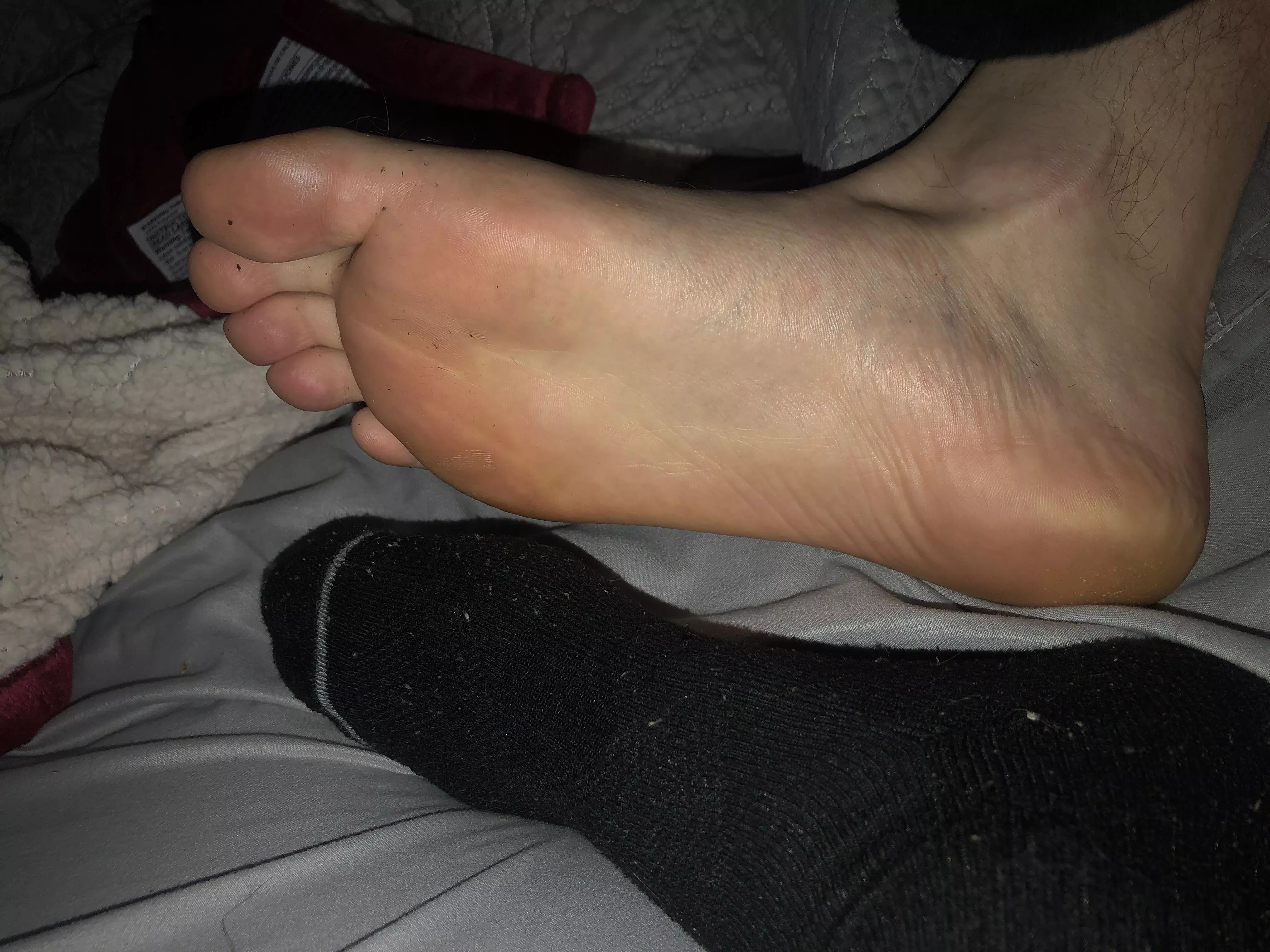 One sock on and one sock off. Who wants the other ripe sock? 😈 posted by twoguysfeet