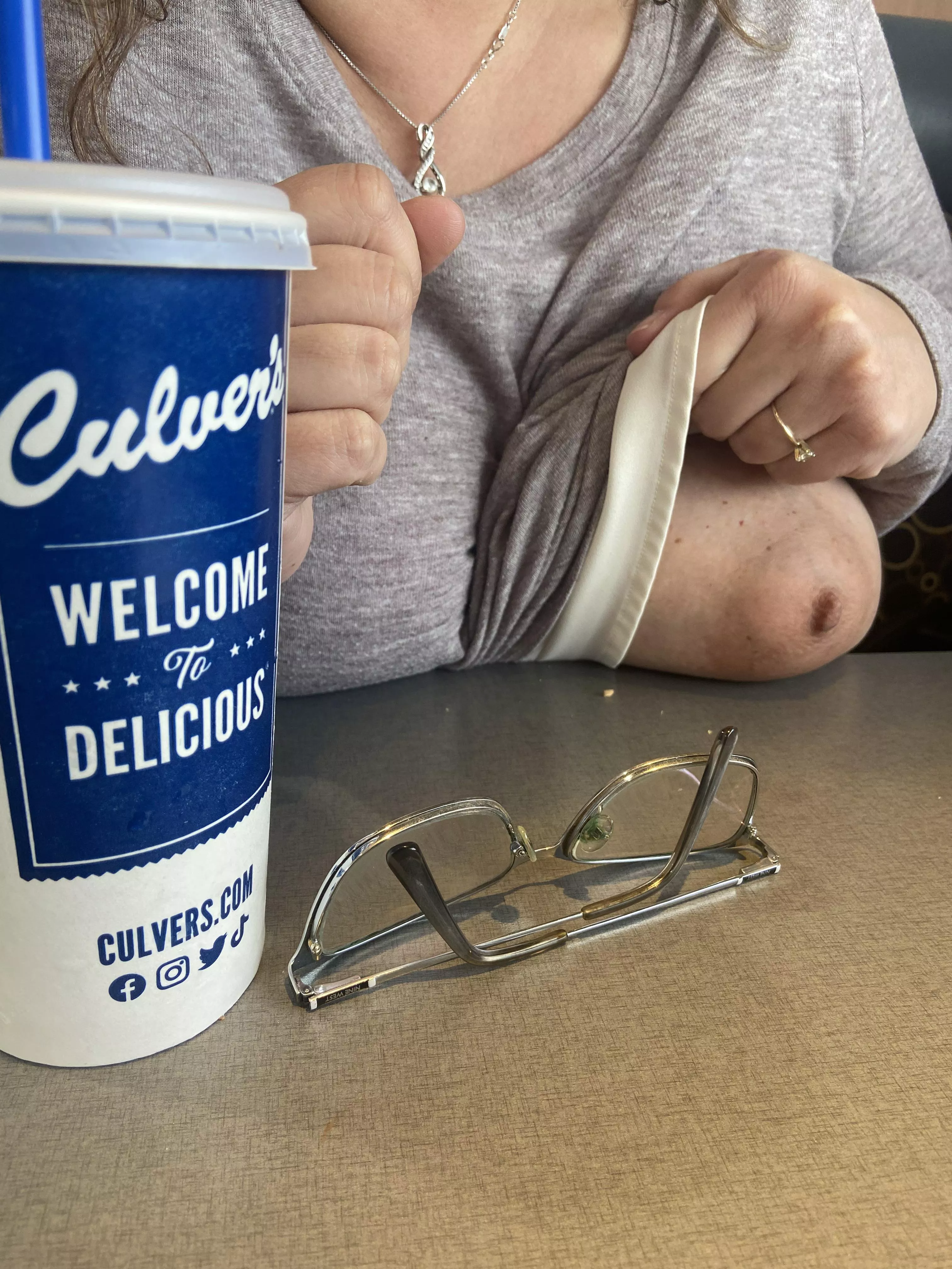 One tit flash for lunch while an older couple looks on. posted by Boobies1969