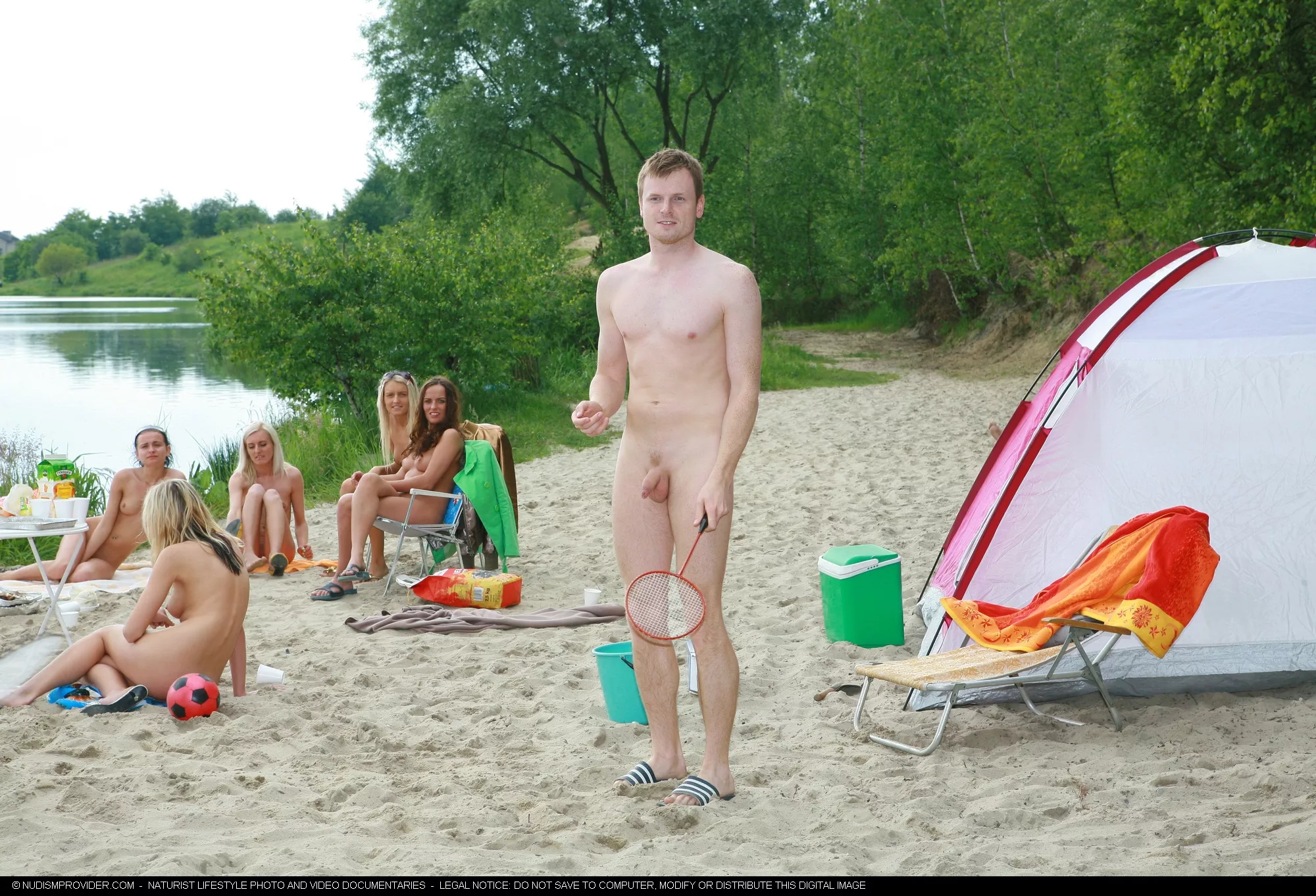 Playing badminton posted by NaturistPictures