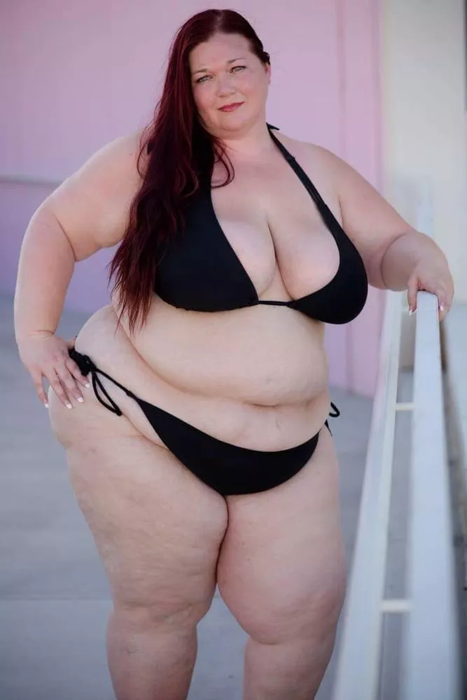 Plump and pale redhead in a black bikini posted by Udderluvr2020