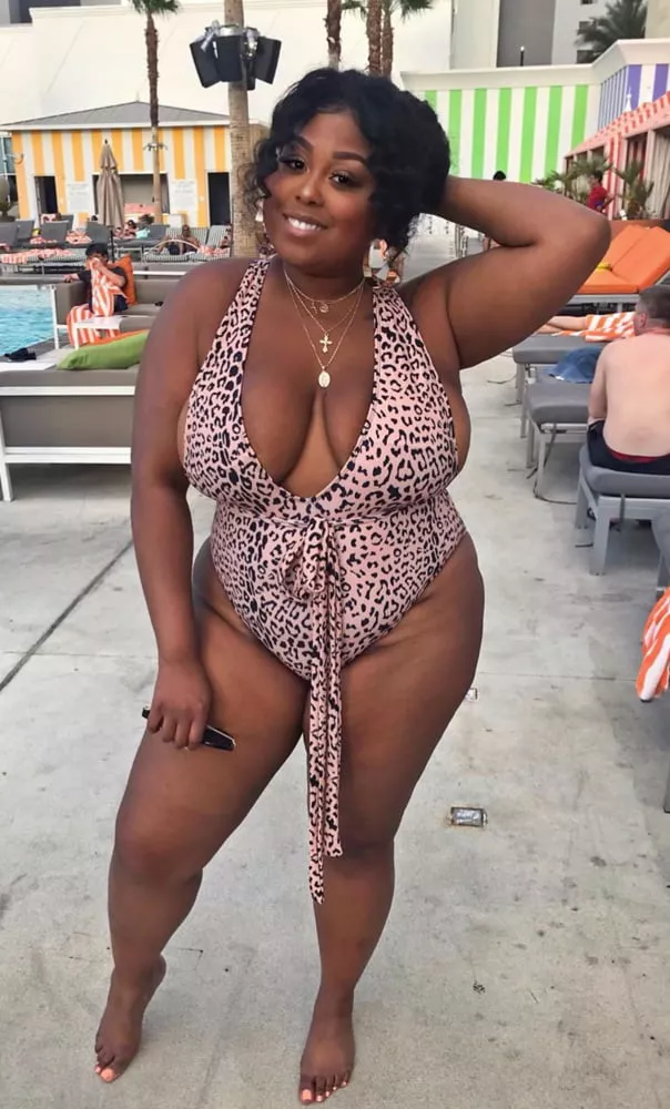 Plump beauty in an animal print one piece posted by Udderluvr2020