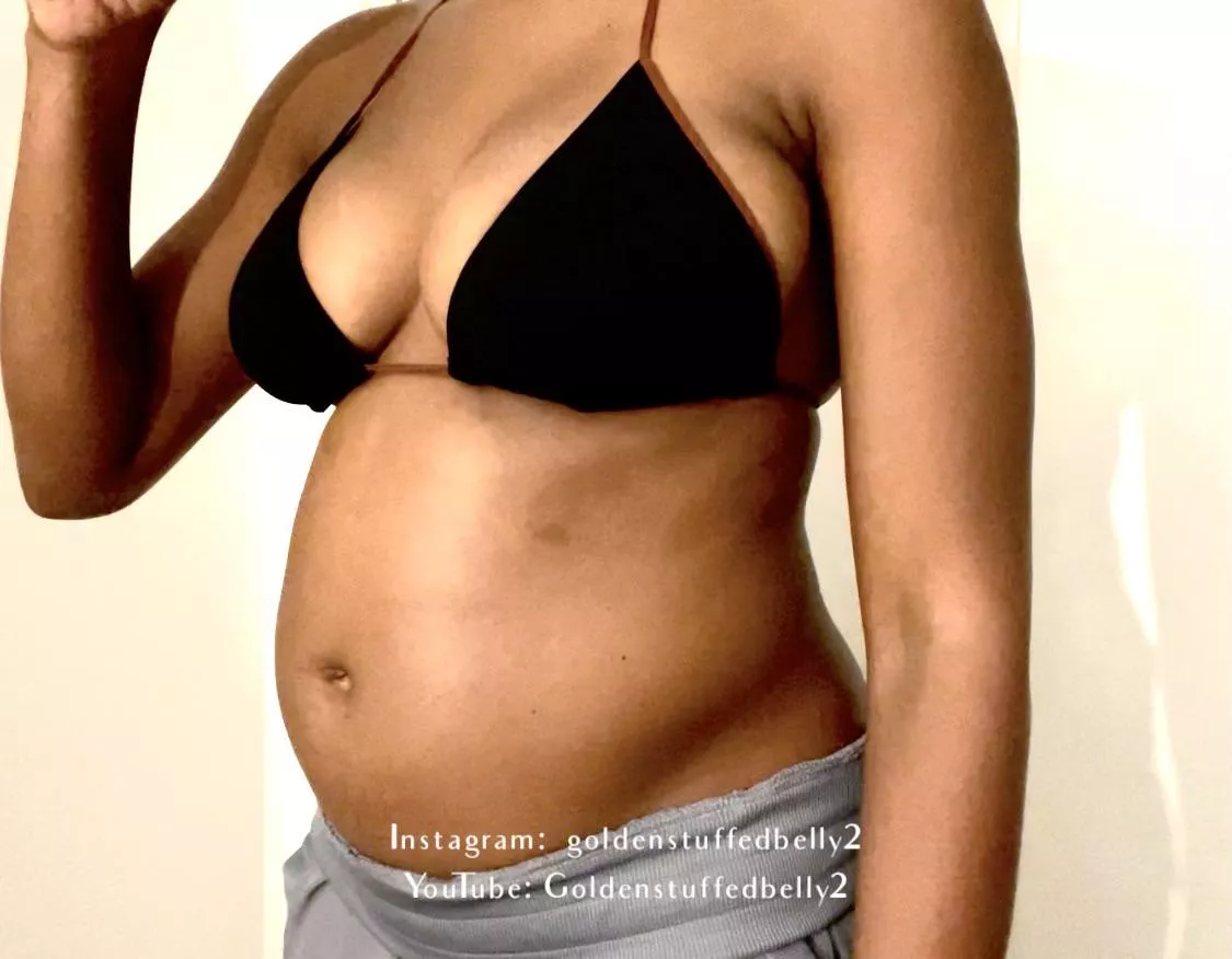 Plump belly in bikini top. What do you think? posted by goldenstuffedbelly2