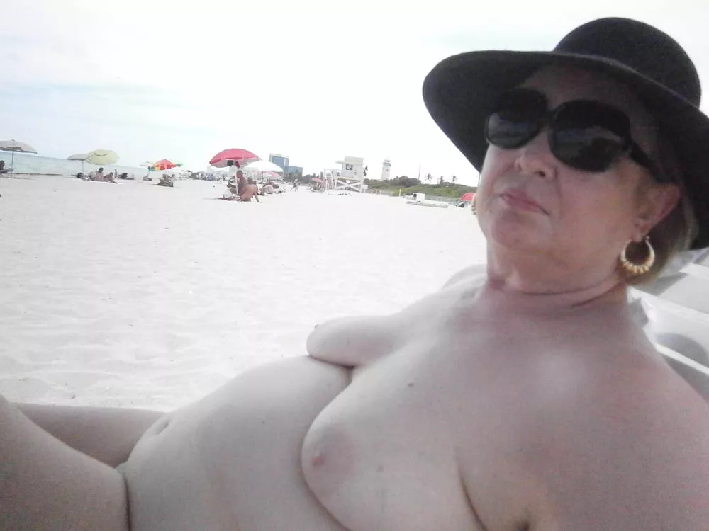 Plump older nudist relaxing on the beach posted by Udderluvr2020