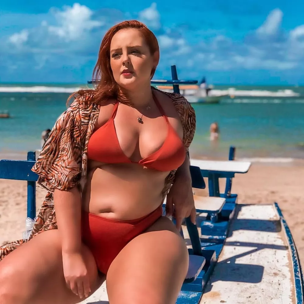 Plump tan redhead on the beach posted by Udderluvr2020