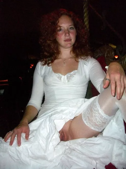 Redhead bride giving us a peek posted by ValeriesPanties