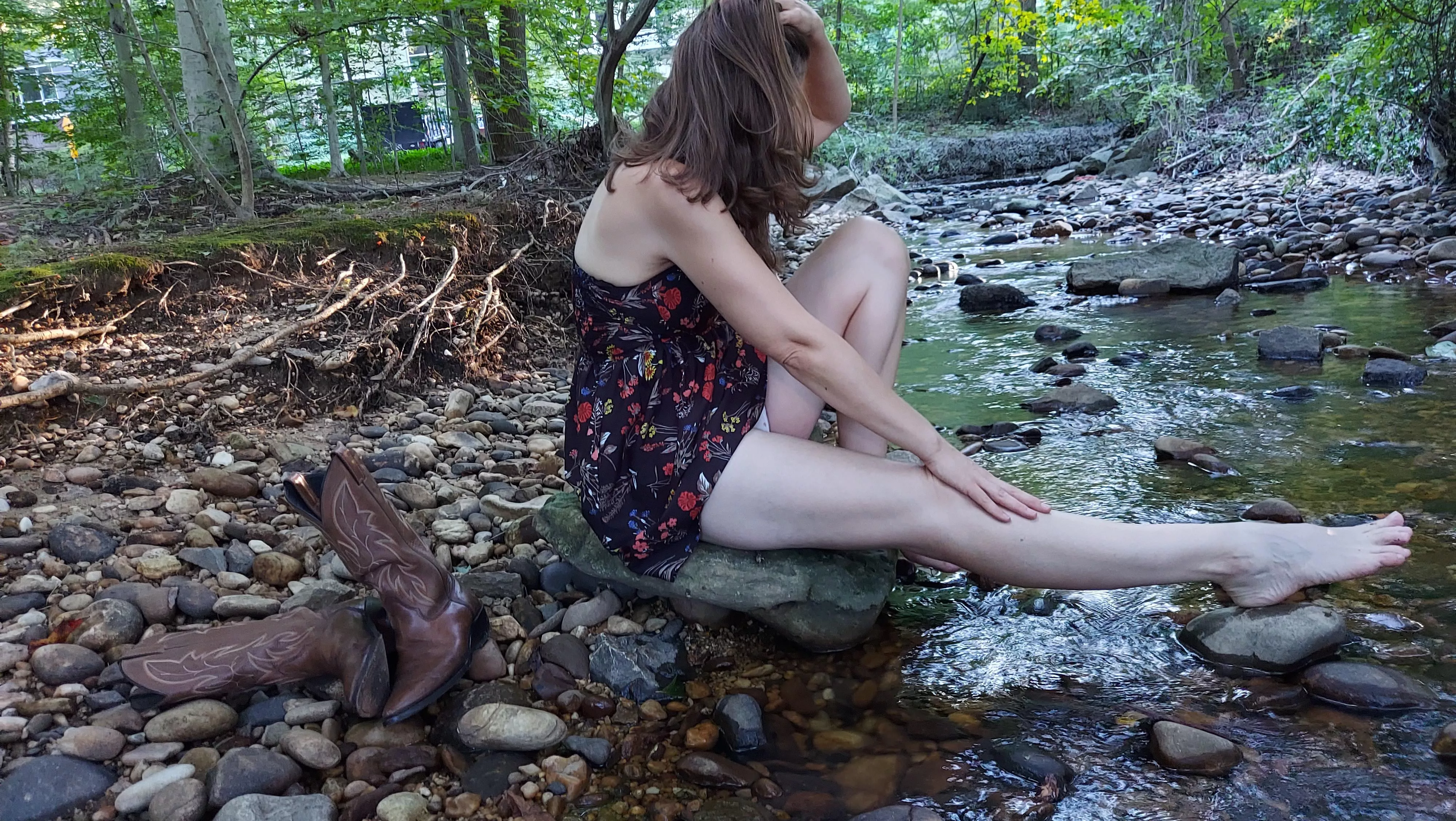 Relaxing by the water with my cowgirl boots 🥰 posted by msjanejenkins