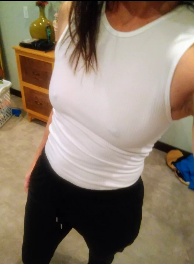 Same hotwife, subtlety different. White tank and no bra is my fave! posted by midwesthotwifeguy37