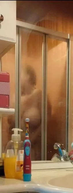 Saw mom in the shower...i tried to get a better pic, but she saw me. posted by BigBiDaddyNC