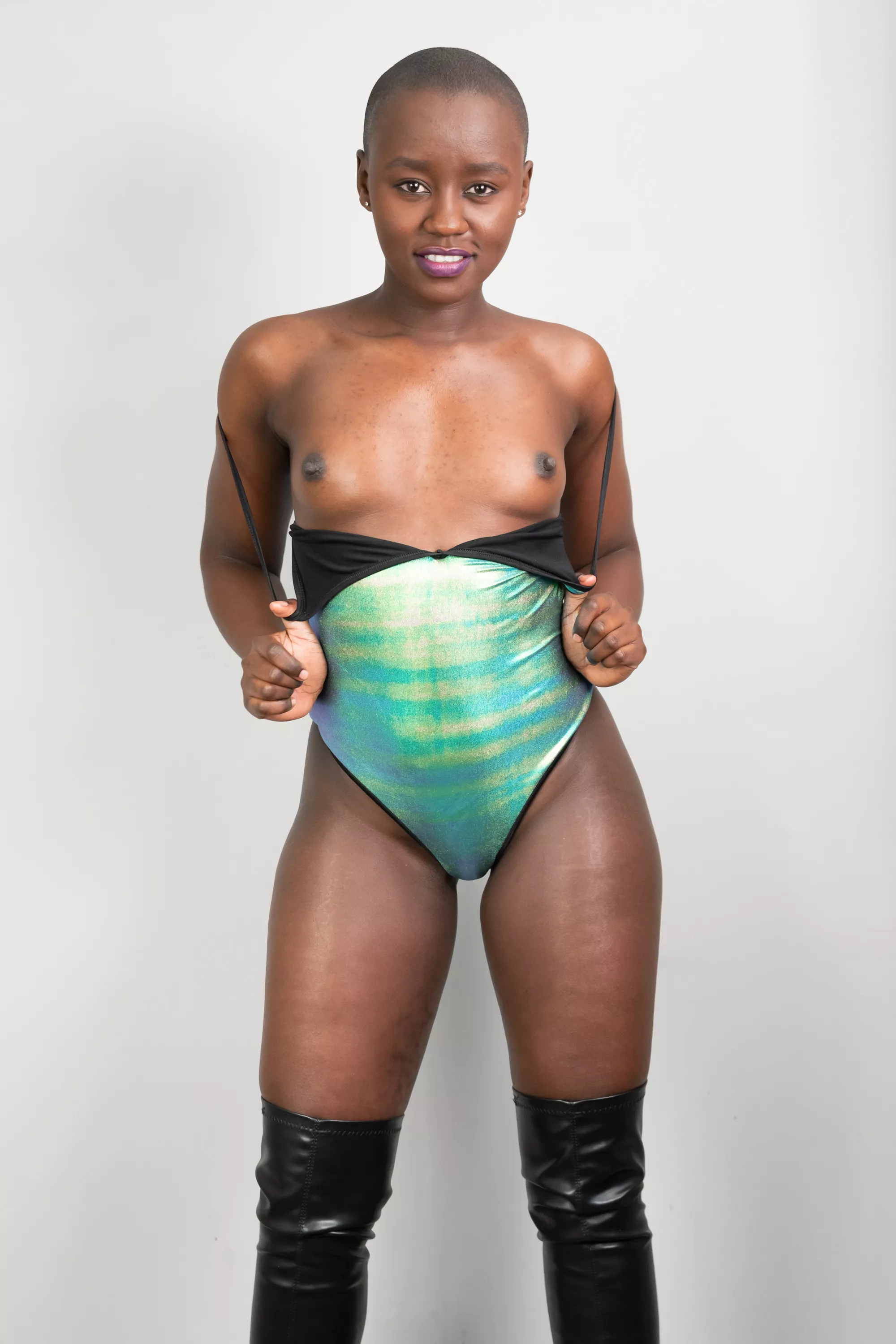 shiny metallic swimsuit posted by baldgirl_shaza