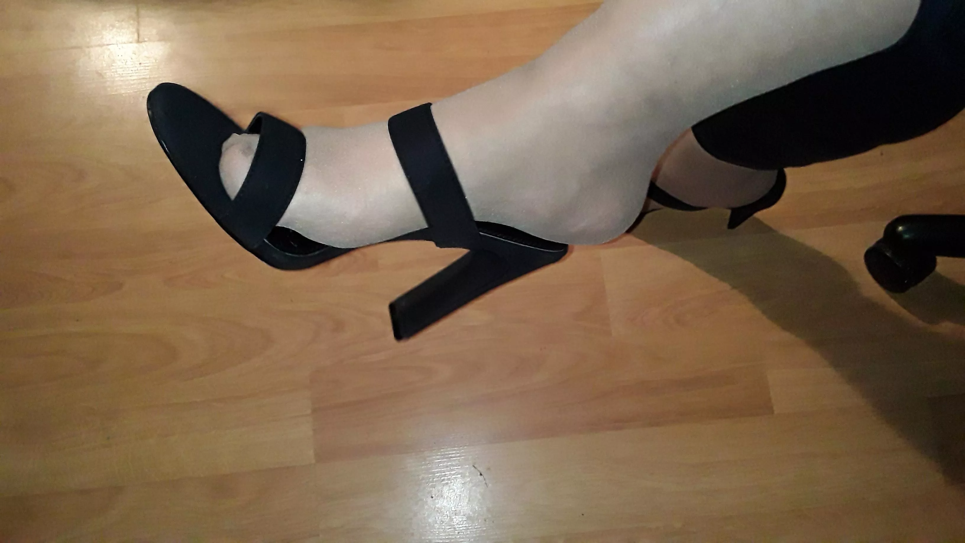 Shiny nylons and a pair of two strap heels... posted by sweetfeetsplace