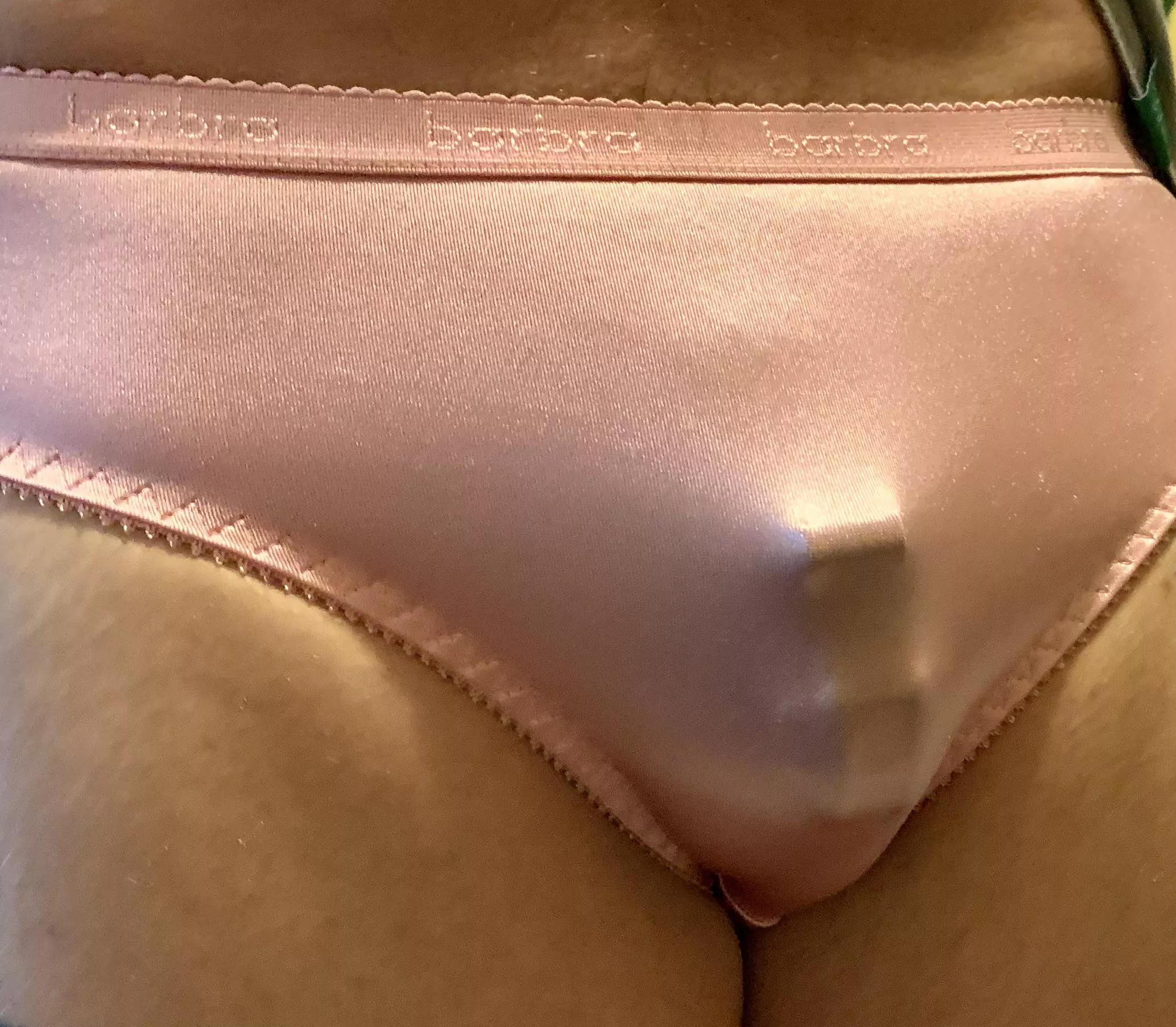 Shiny, satin, pink. A pussy boy’s perfect panties. posted by CagedandPantied