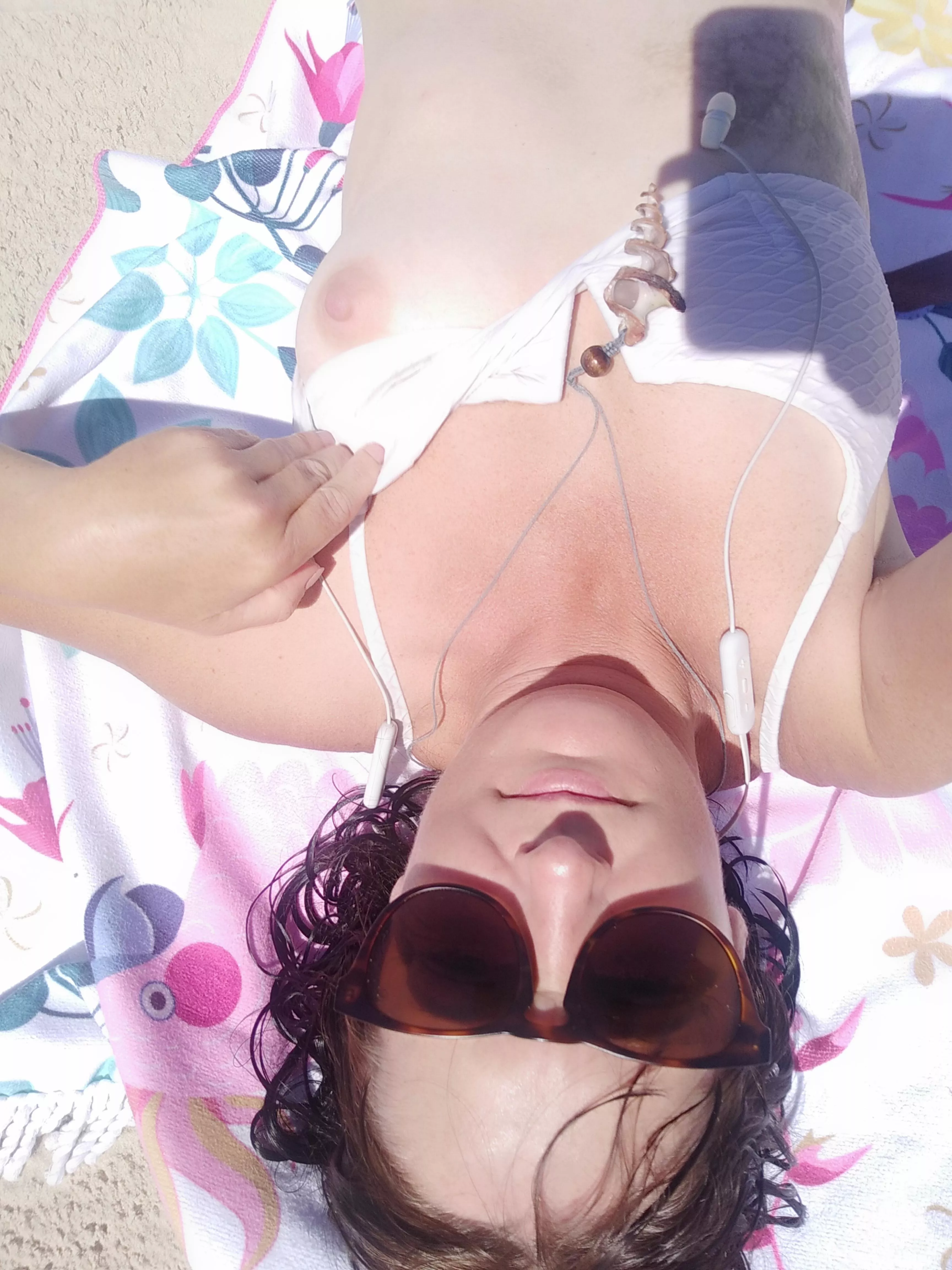 Sneaky beach titty posted by mynameisnotvixen