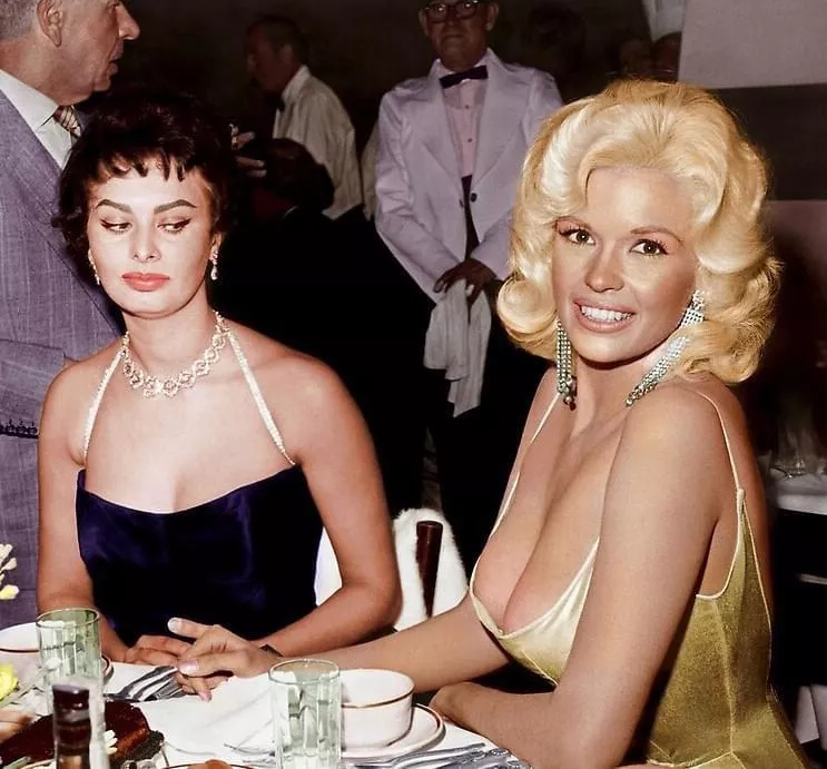 Sophia Loren gives Jayne Mansfield the side-eye. 👀 The photo, taken at a Paramount Pictures party to welcome Loren to Hollywood in 1957, was later colorized. posted by dr_drippy