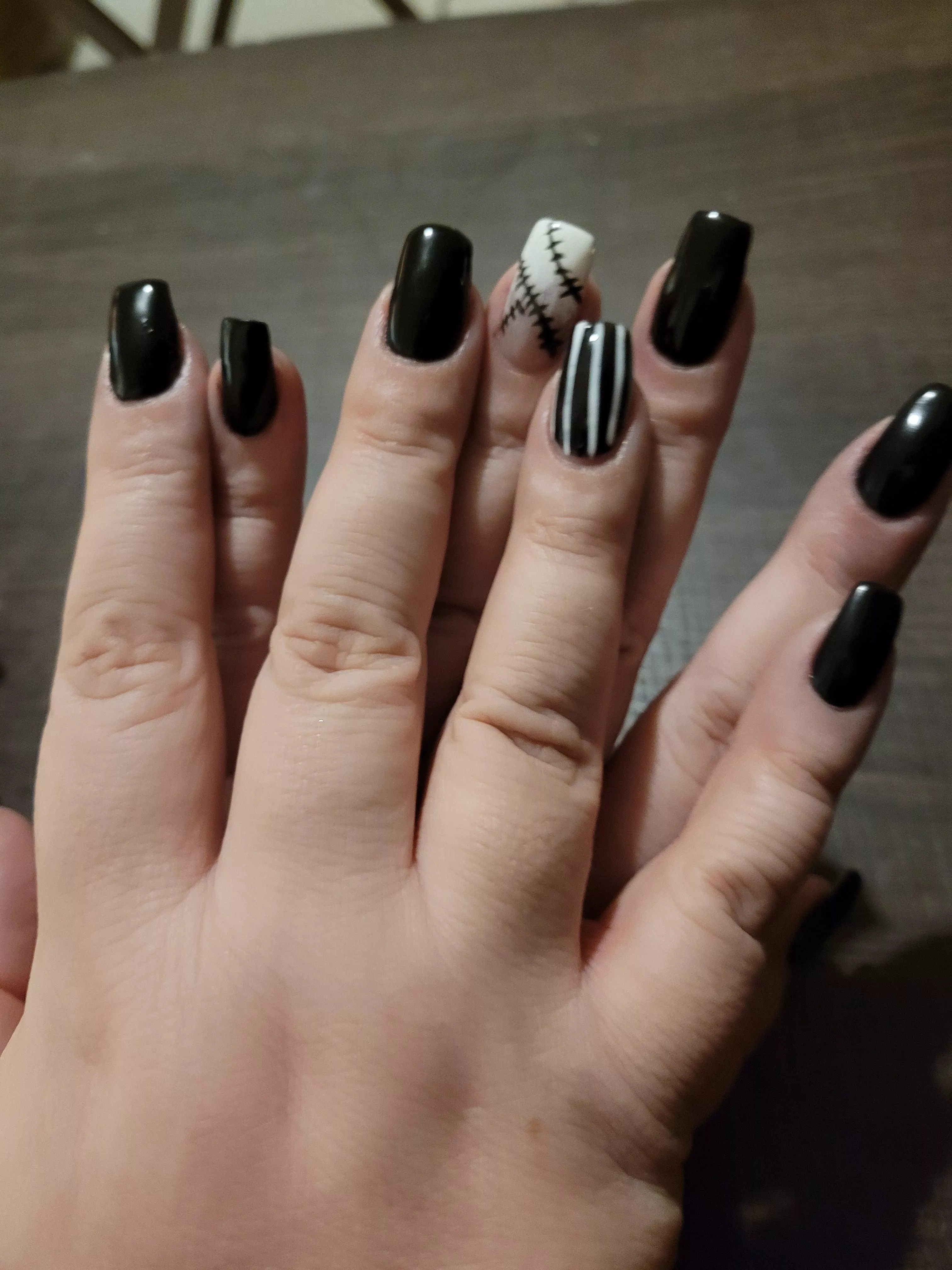 Spoopy Jack and Sally nails! posted by Obvious-Courage8434