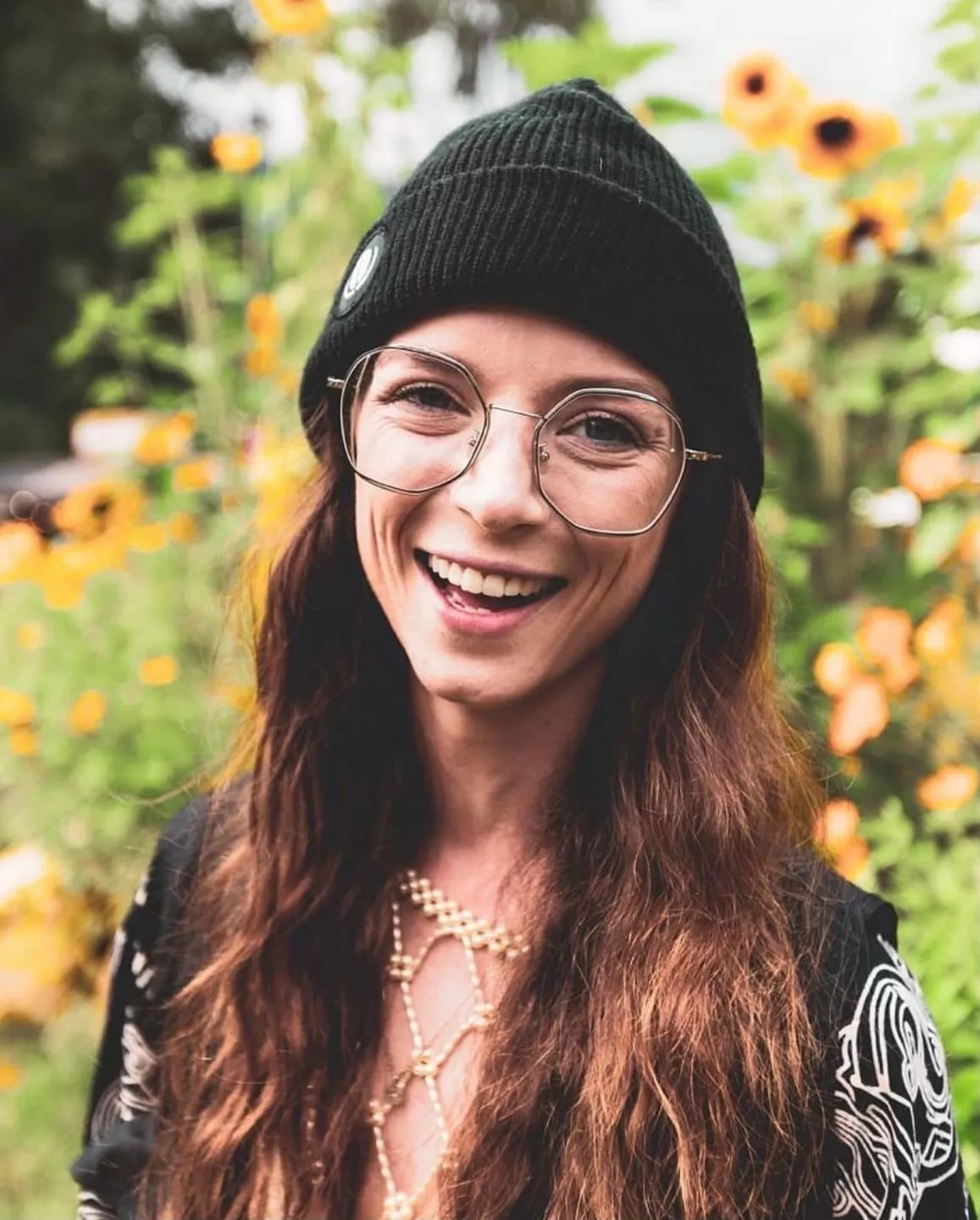 Surrounded by sunflowers and nothing but smiles posted by ashtonfaye