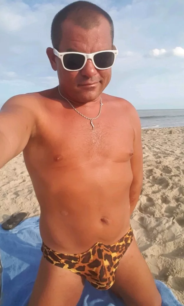 Tanning on the beach and watching porn on my phone got me hard enough for this pic posted by Swimming_Anything_50