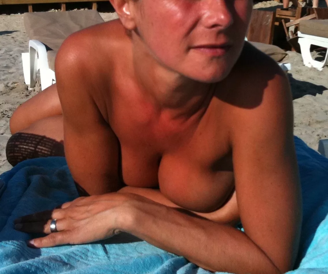 Tanning topless on the french riviera, showing my wedding ring as so many guyz were looking at me ;-) posted by ProfessionalLivid394