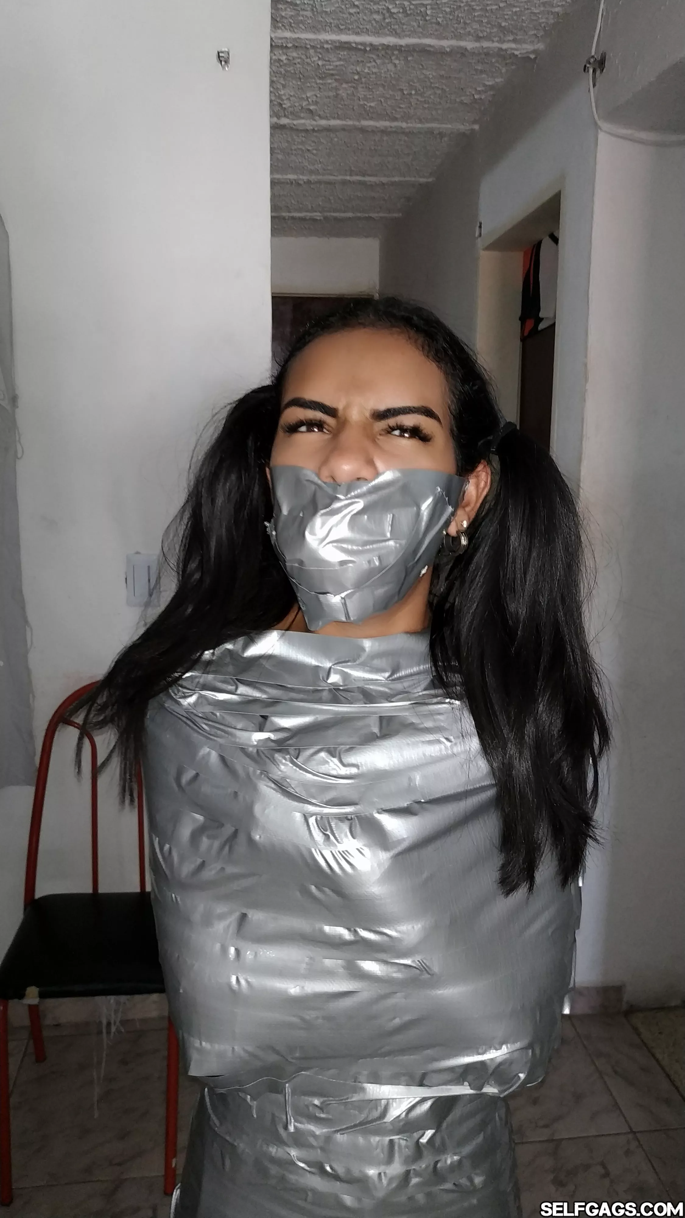 Tape Gagged Latina Mummy posted by Selfgags