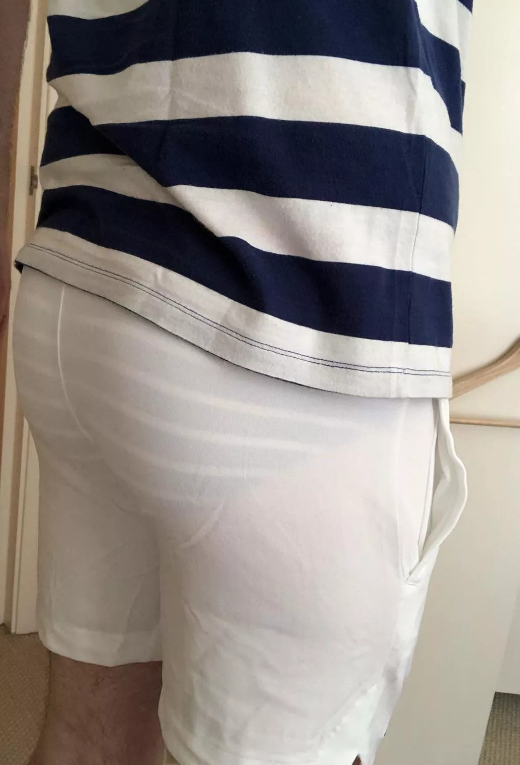 Tennis shorts are unlined, so when you wear white ones, they donâ€™t hide much. Perhaps stripey underwear wasnâ€™t the best choice. posted by Richardts220