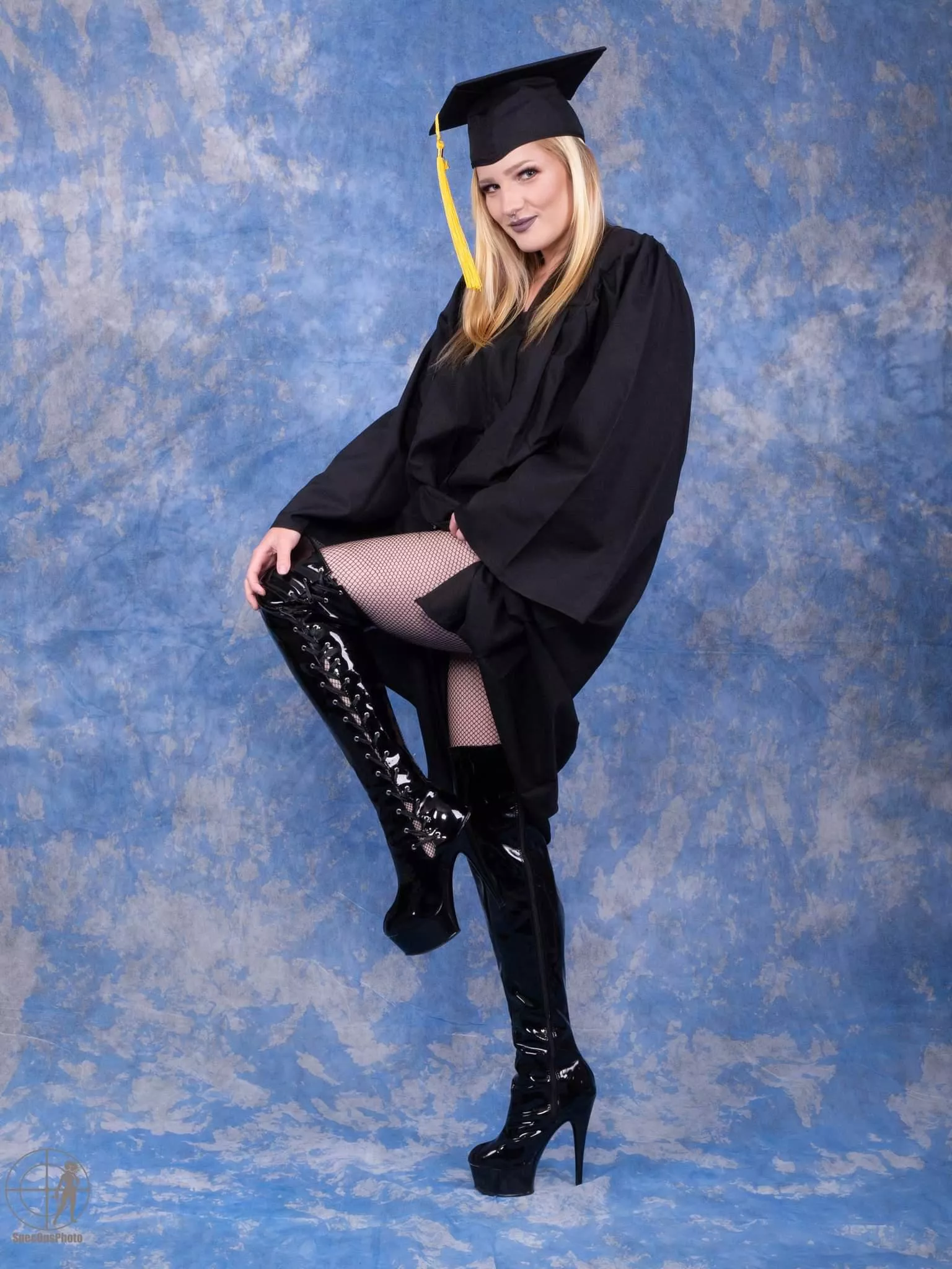 The boots under my grad gown posted by sweetcheekscapone