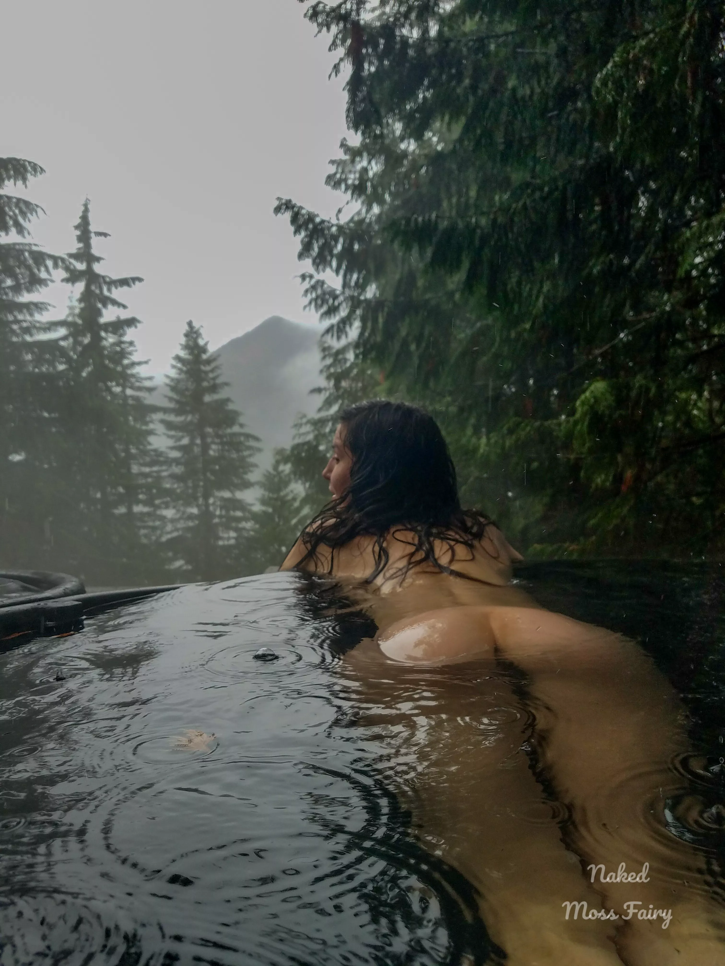 The contrast of the cold rain kissing my skin while soaking in a hot spring gives me body tingles🥰 posted by NakedMossFairy