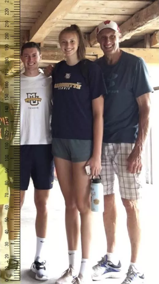 This guy is 6â€™4â€ and he is absolutely dwarfed by his 6â€™10â€ little sister and 7â€™0â€ father! posted by bsskfkd