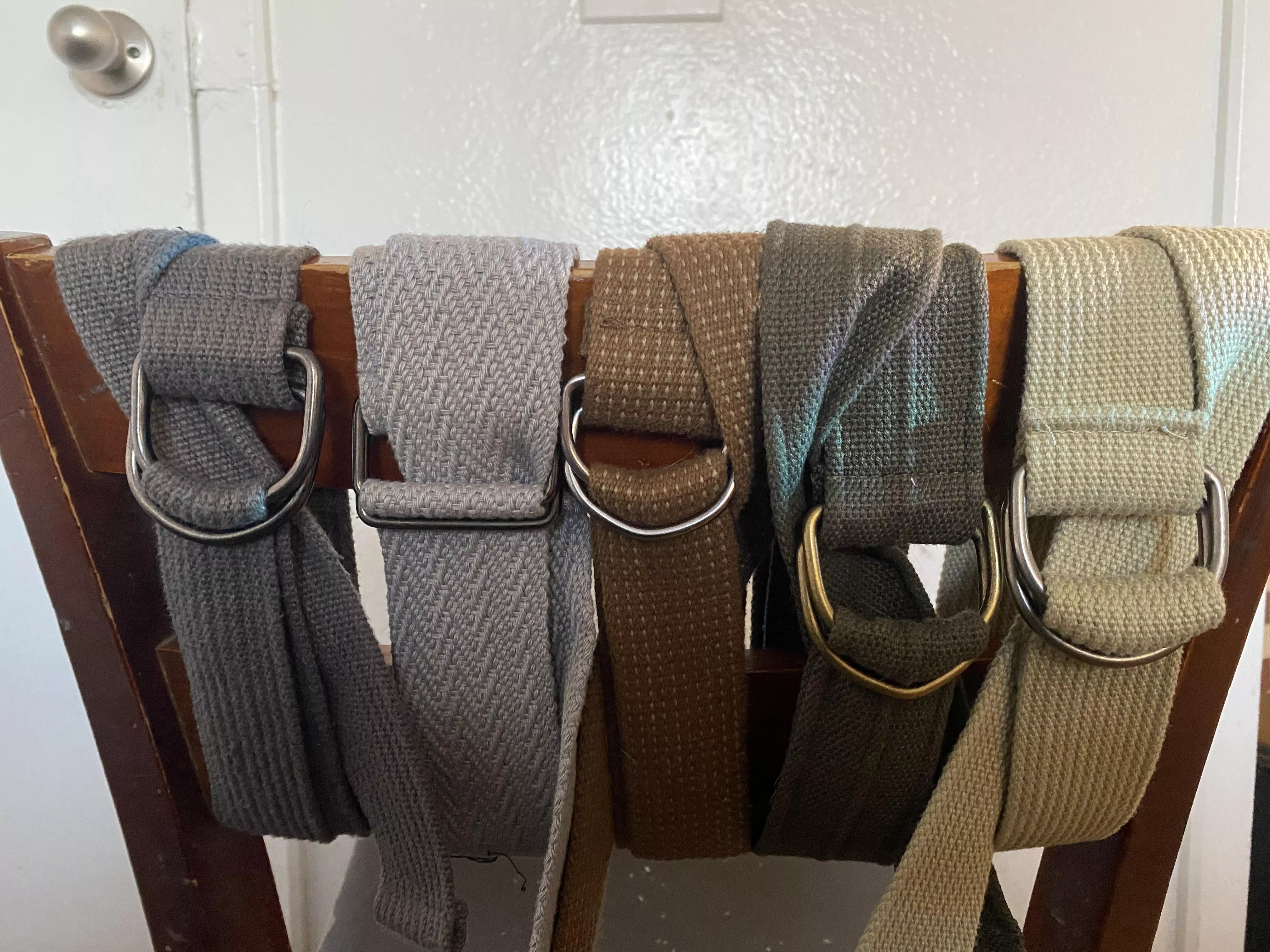 This Riggers Style Belt is definitely the type you should look for. Bonus when not in use it pads the wooden chair very well. posted by Bigob84