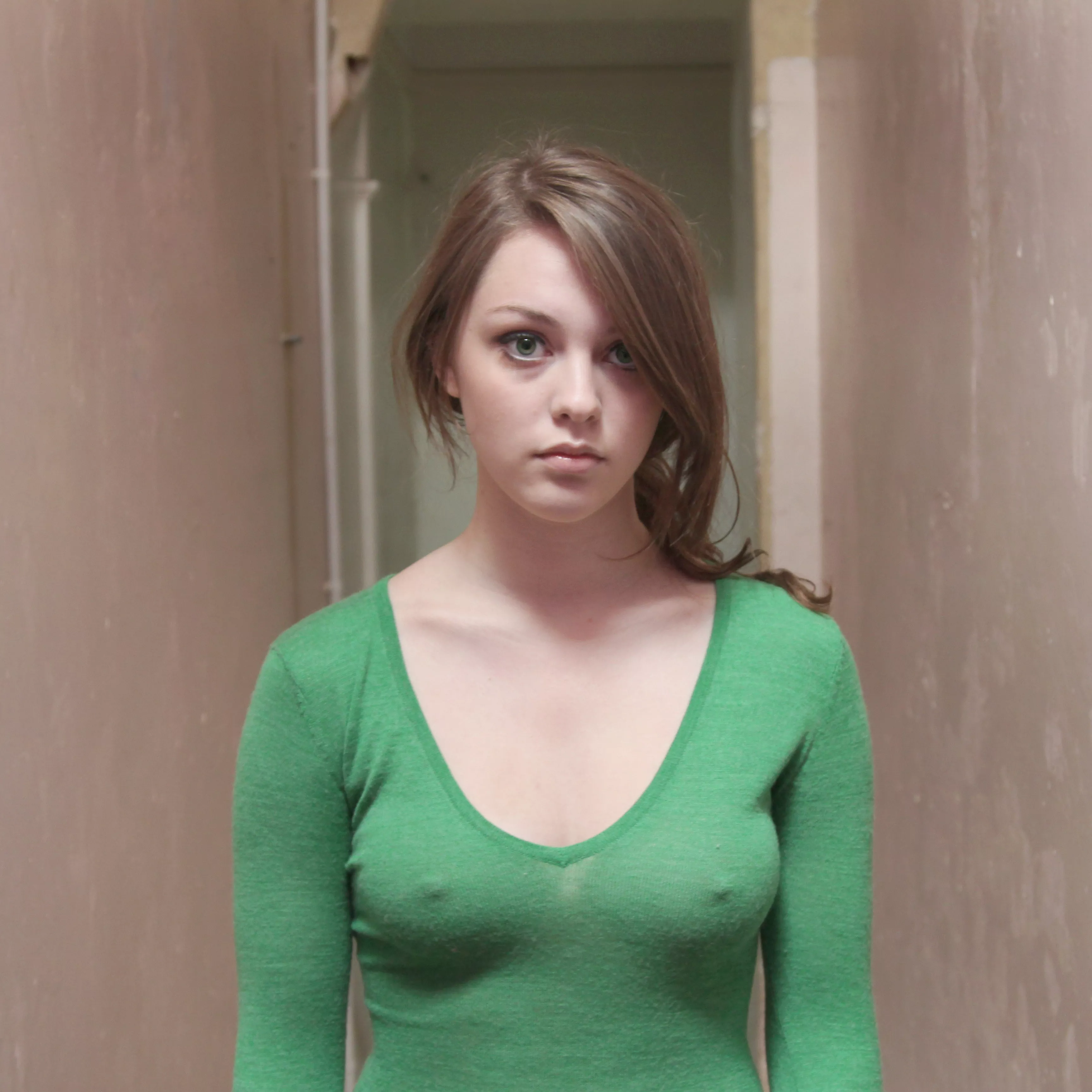 Tight green sweater posted by poogramsupervisor