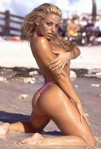 Trish Stratus on the beach in 1998 posted by Stratusfactiontime