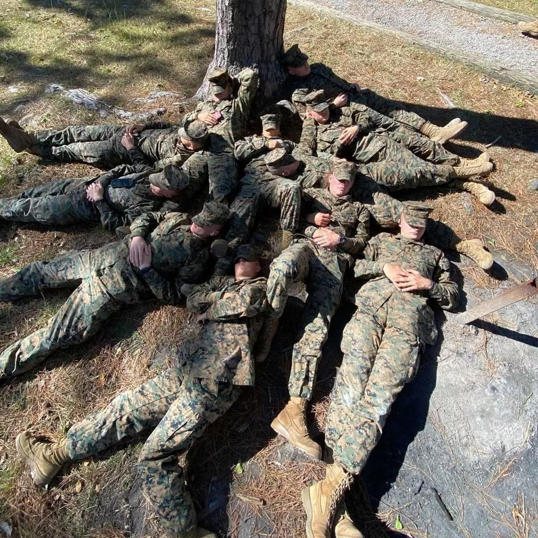 Uniformed Marines in a dogpile posted by CGHJ